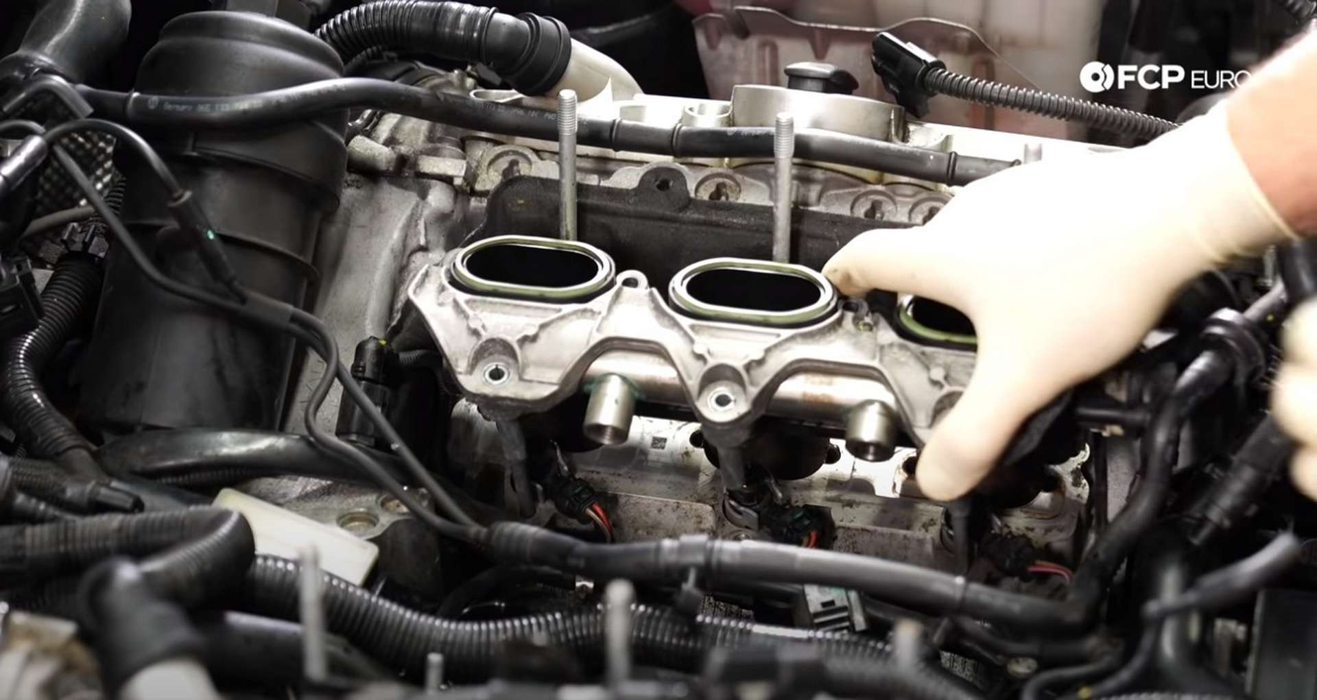 DIY Audi 3.0t Walnut Blasting Intake Valves installing the manifold/tumble flap housing