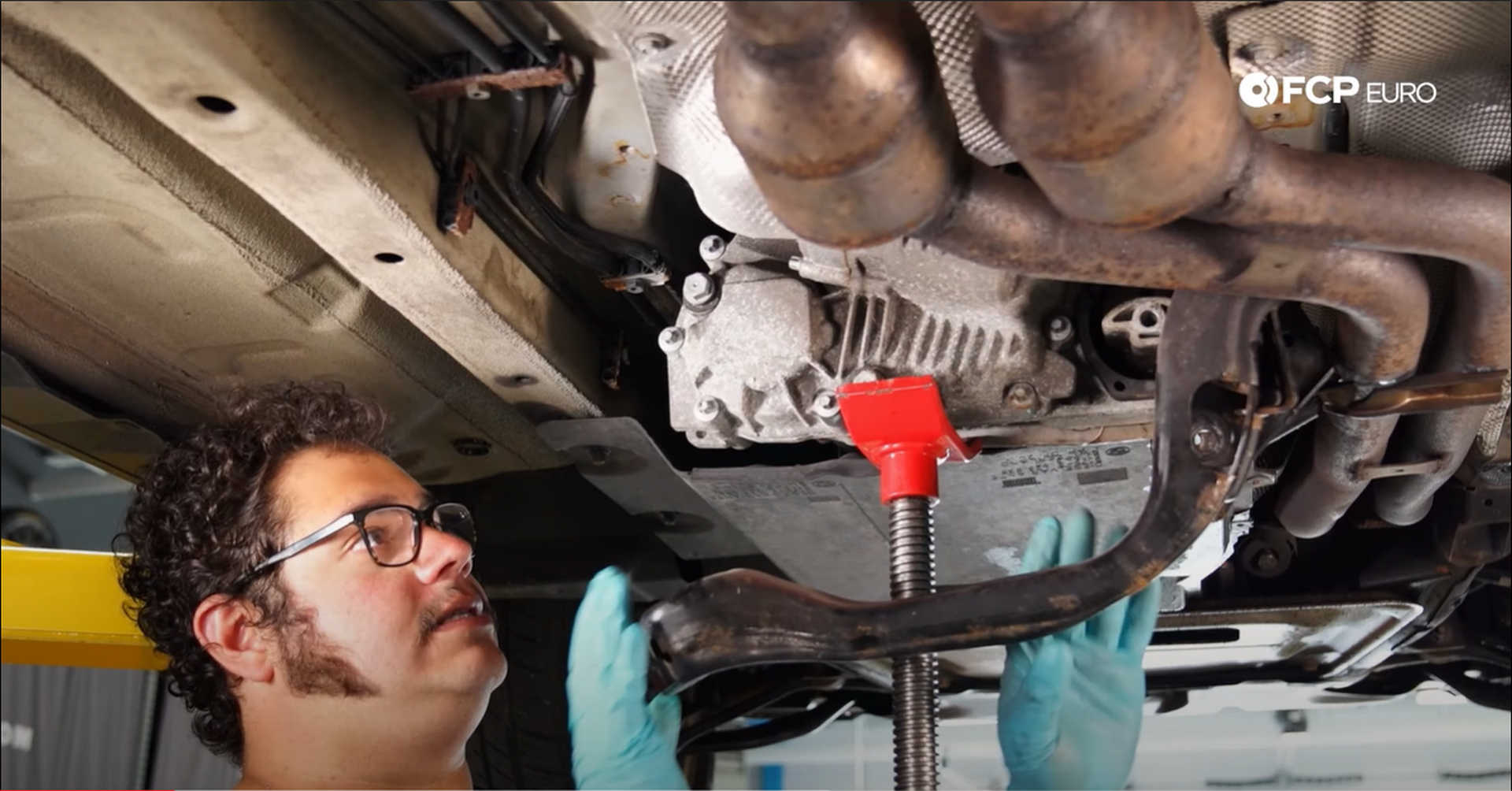 DIY BMW X3 Transfer Case Actuator crossmember hanging