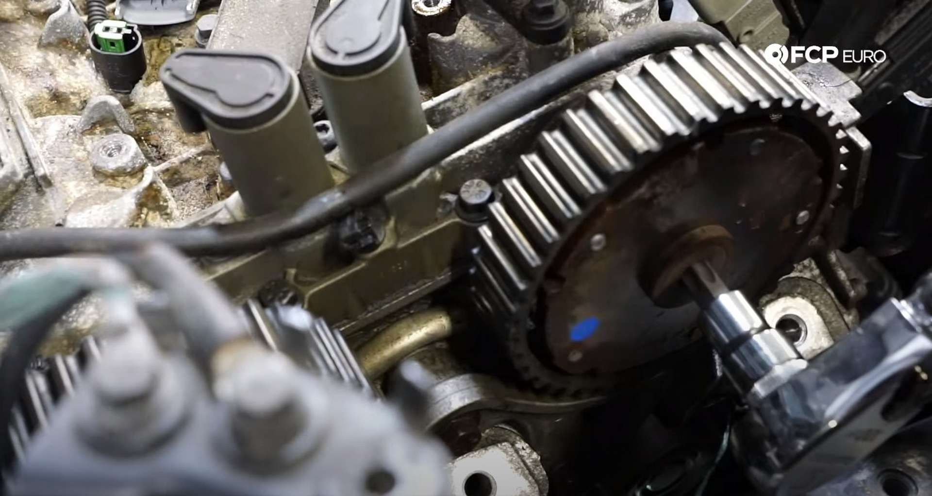 DIY Volvo P1 Timing Belt Replacement removing the camshaft sprocket plug