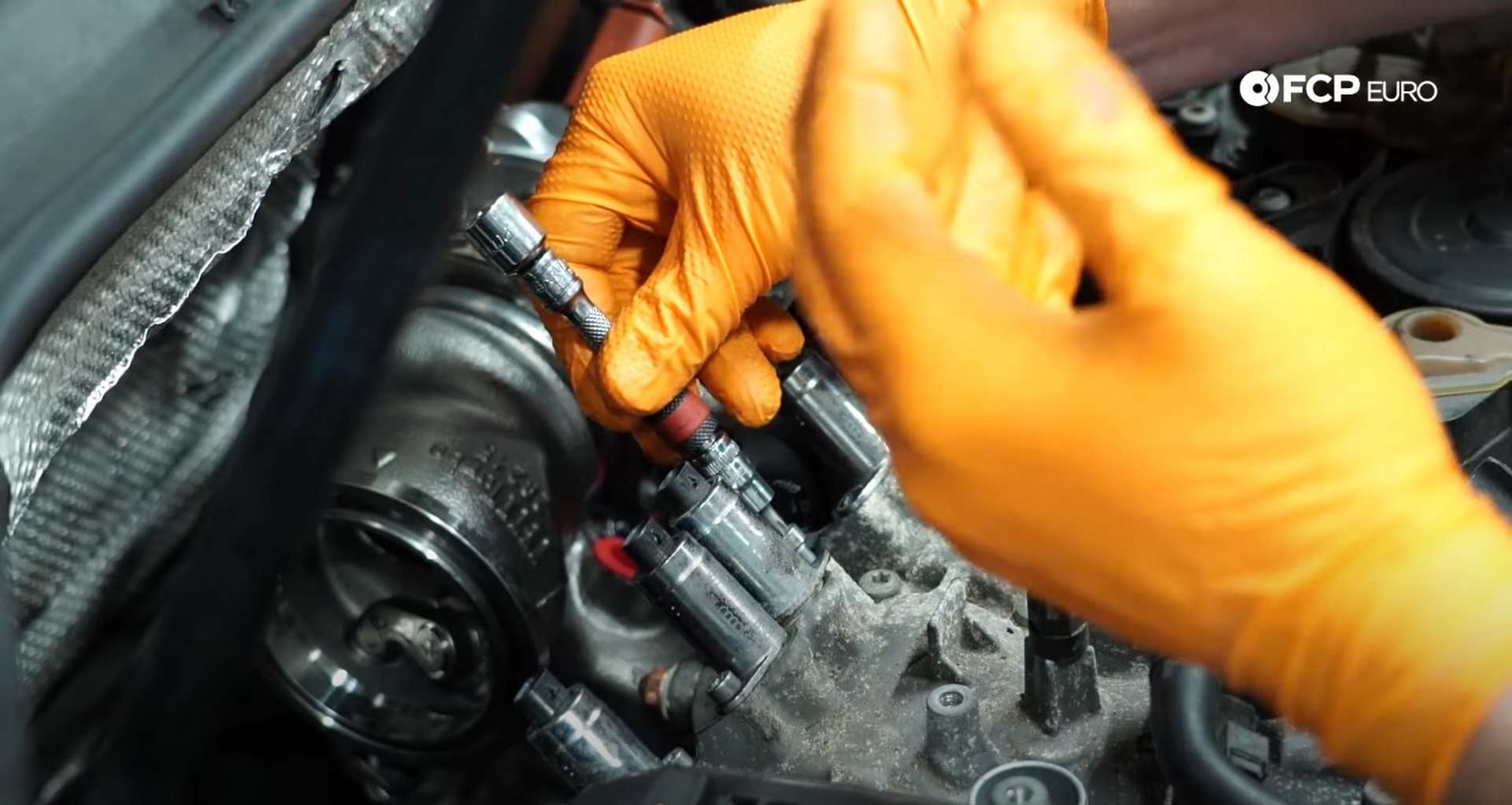DIY MK7 VW GTI Turbocharger Upgrade threading in the valve lift actuator bolts