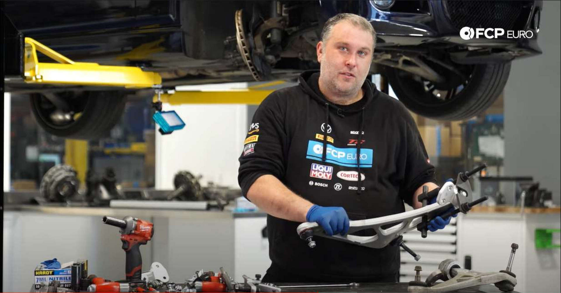 DIY BMW Front Suspension Refresh installing the new bushing