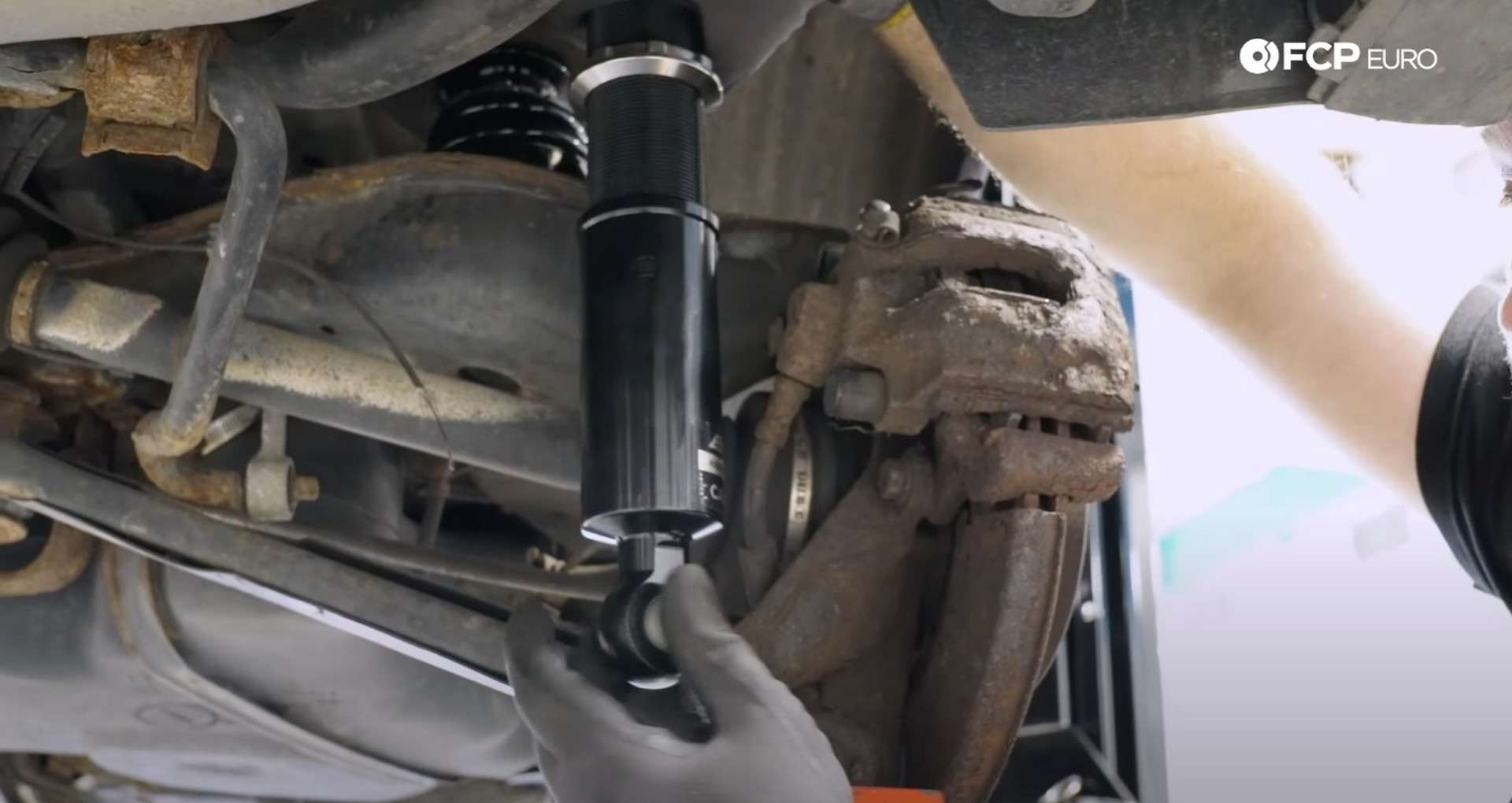 DIY BMW E36 Coilovers extending the lower shock mount