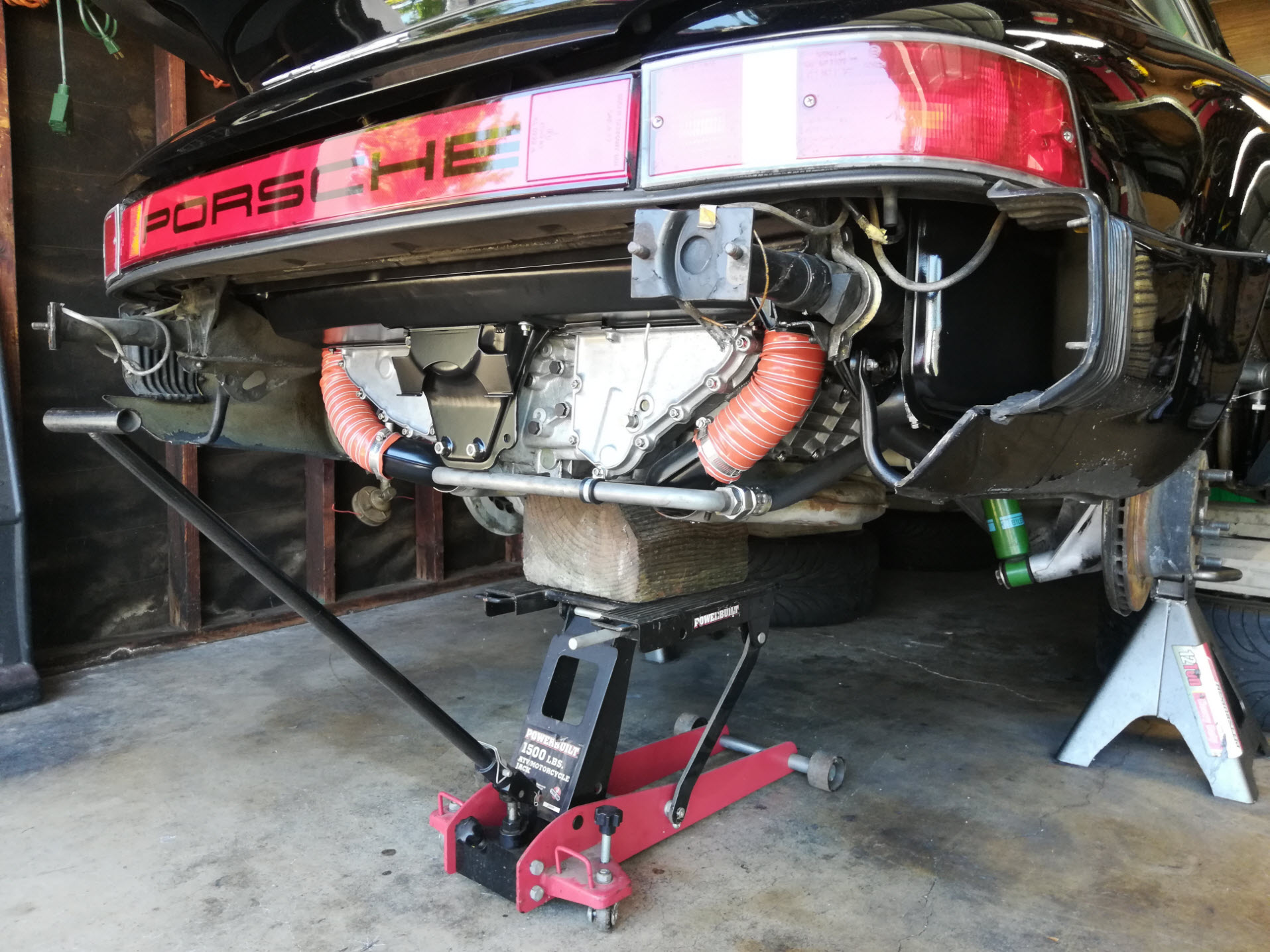Air-cooled Porsche 911 motorcycle jack for engine drop.