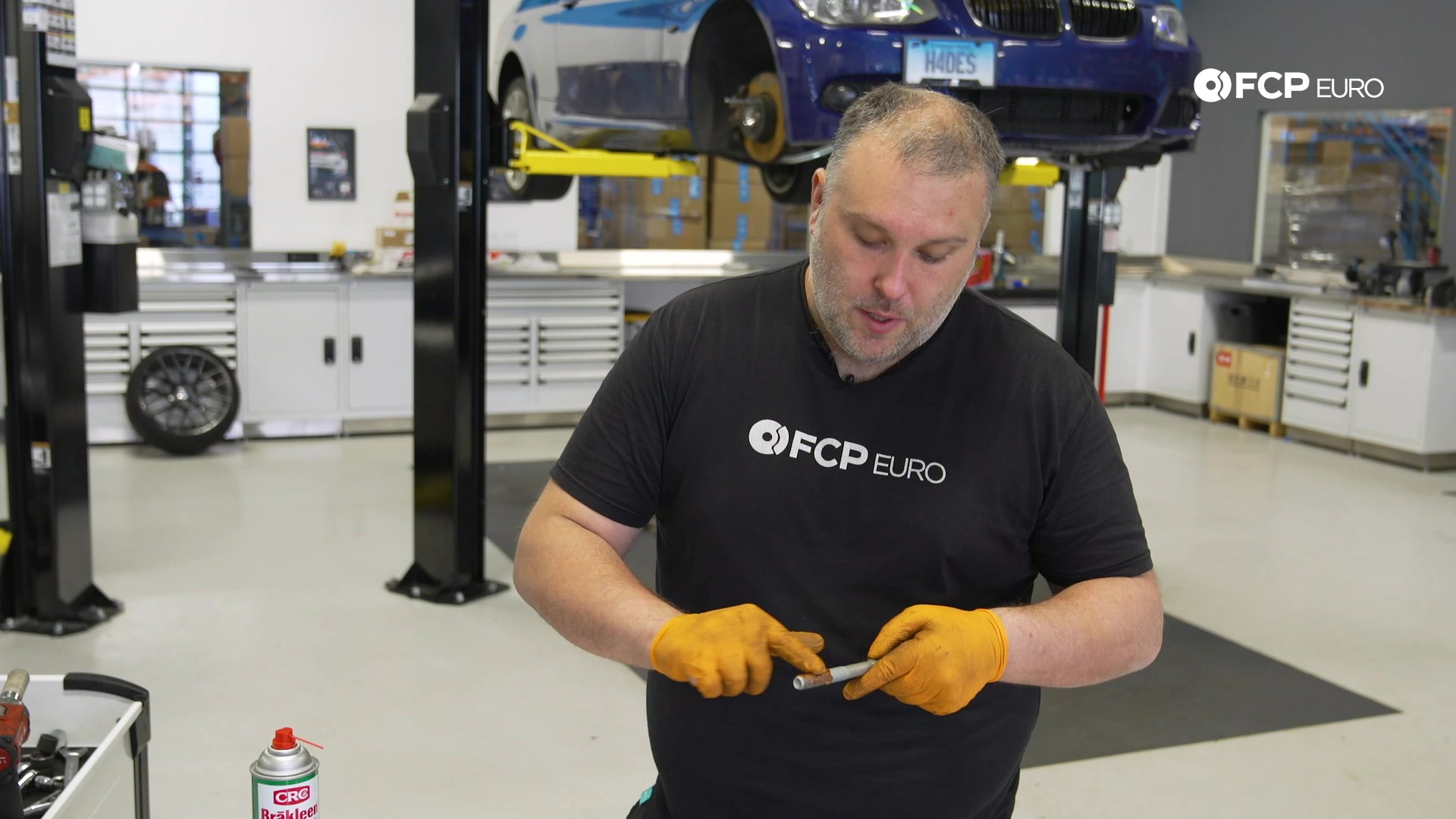 DIY BMW E90 Tie Rod Replacement coating the tie rod in anti-seize
