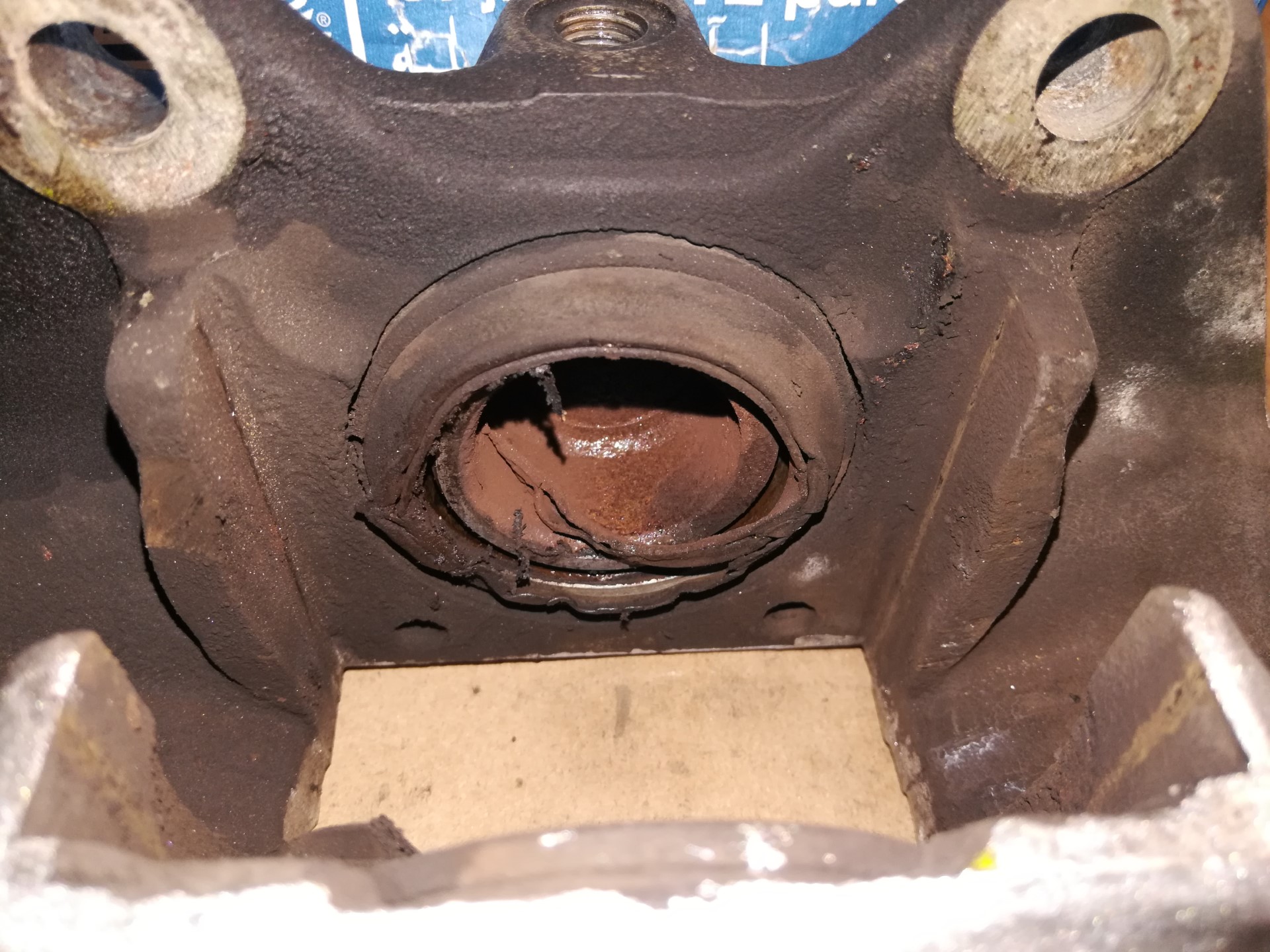 Air-cooled Porsche 911 front caliper piston seal damage