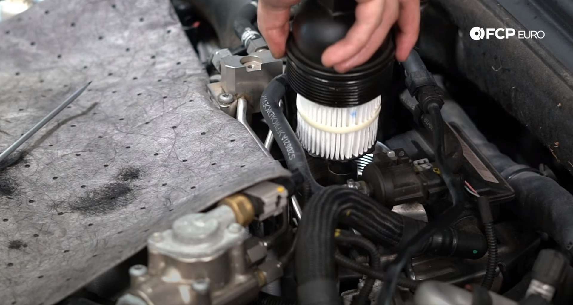 DIY Audi 4.2L V8 Oil Change installing the new oil filter