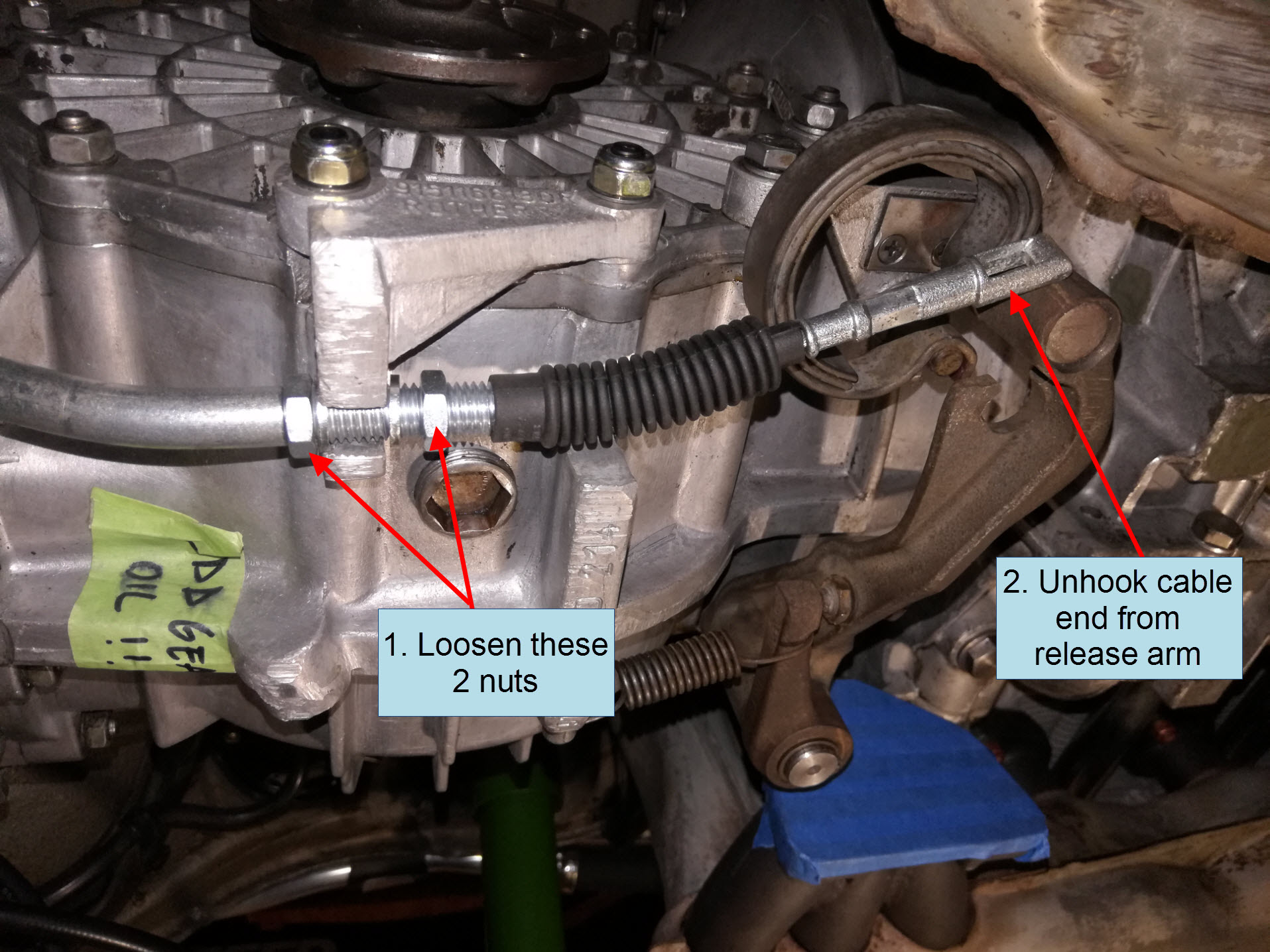 Air-cooled Porsche 911 clutch cable removal at gearbox.
