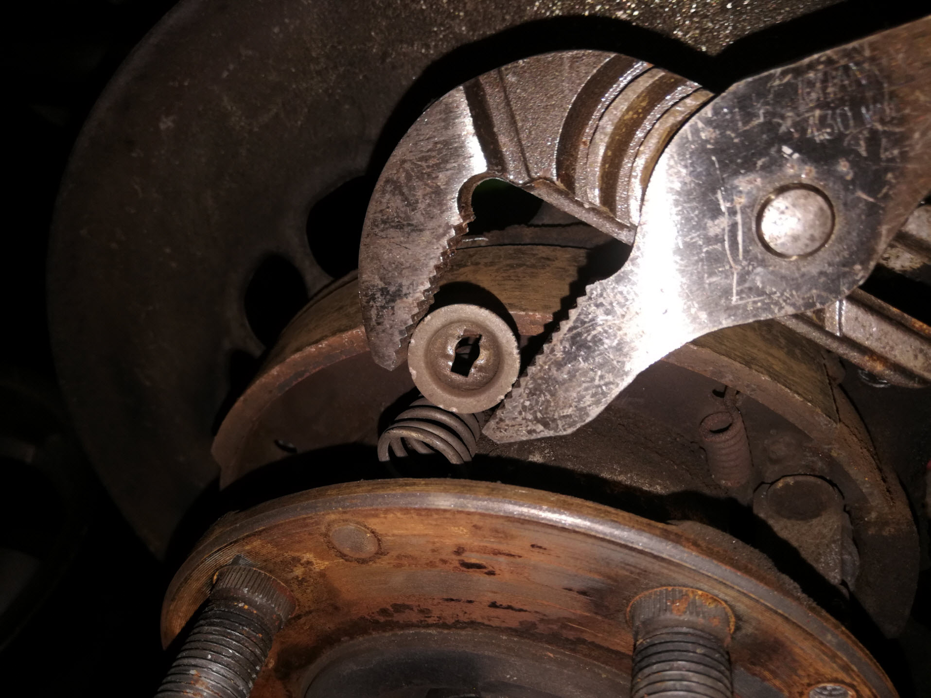 Air-cooled Porsche 911 parking brake springs removal.