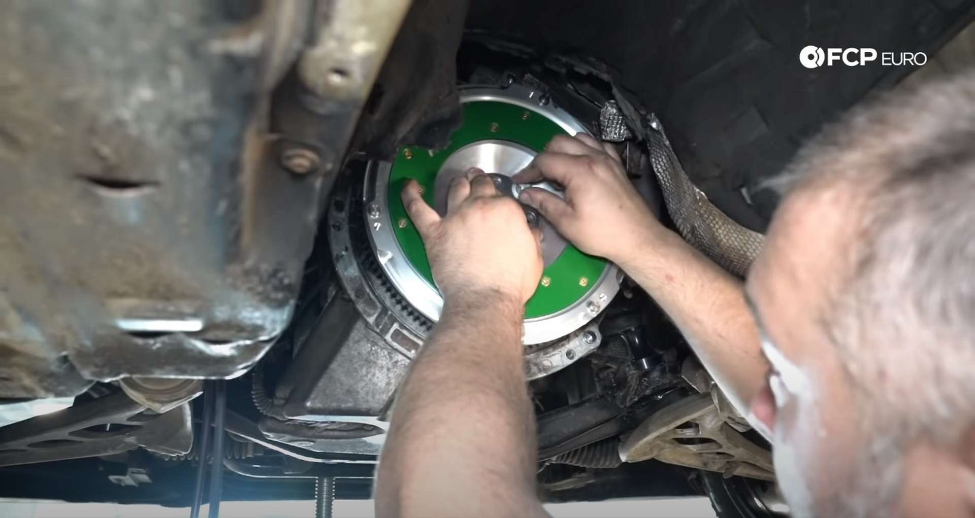DIY BMW E46 Clutch Replacement installing the flywheel
