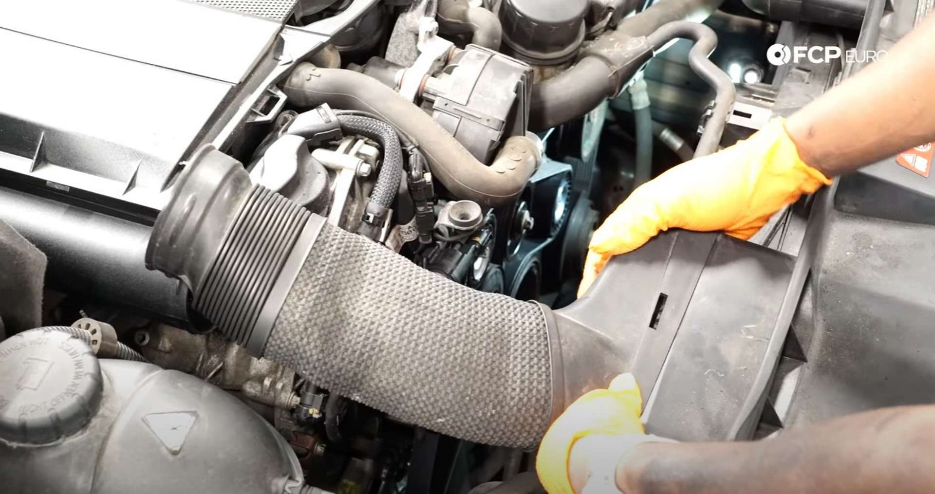 DIY Mercedes W212/204 Alternator and Drive Belt Replacement reconnecting the intake