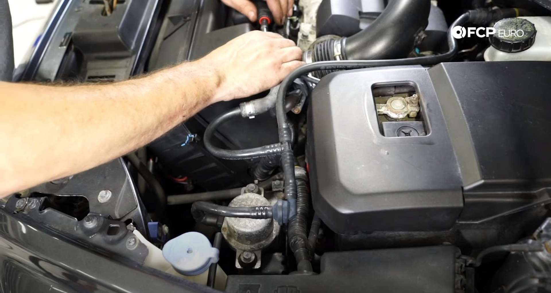 DIY Volvo P1 Timing Belt Replacement installing the vacuum lines