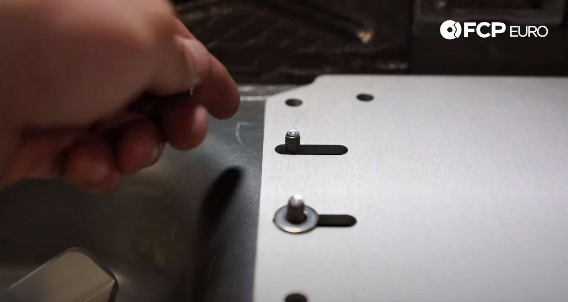 DIY Battery Relocation installing the mounting plate