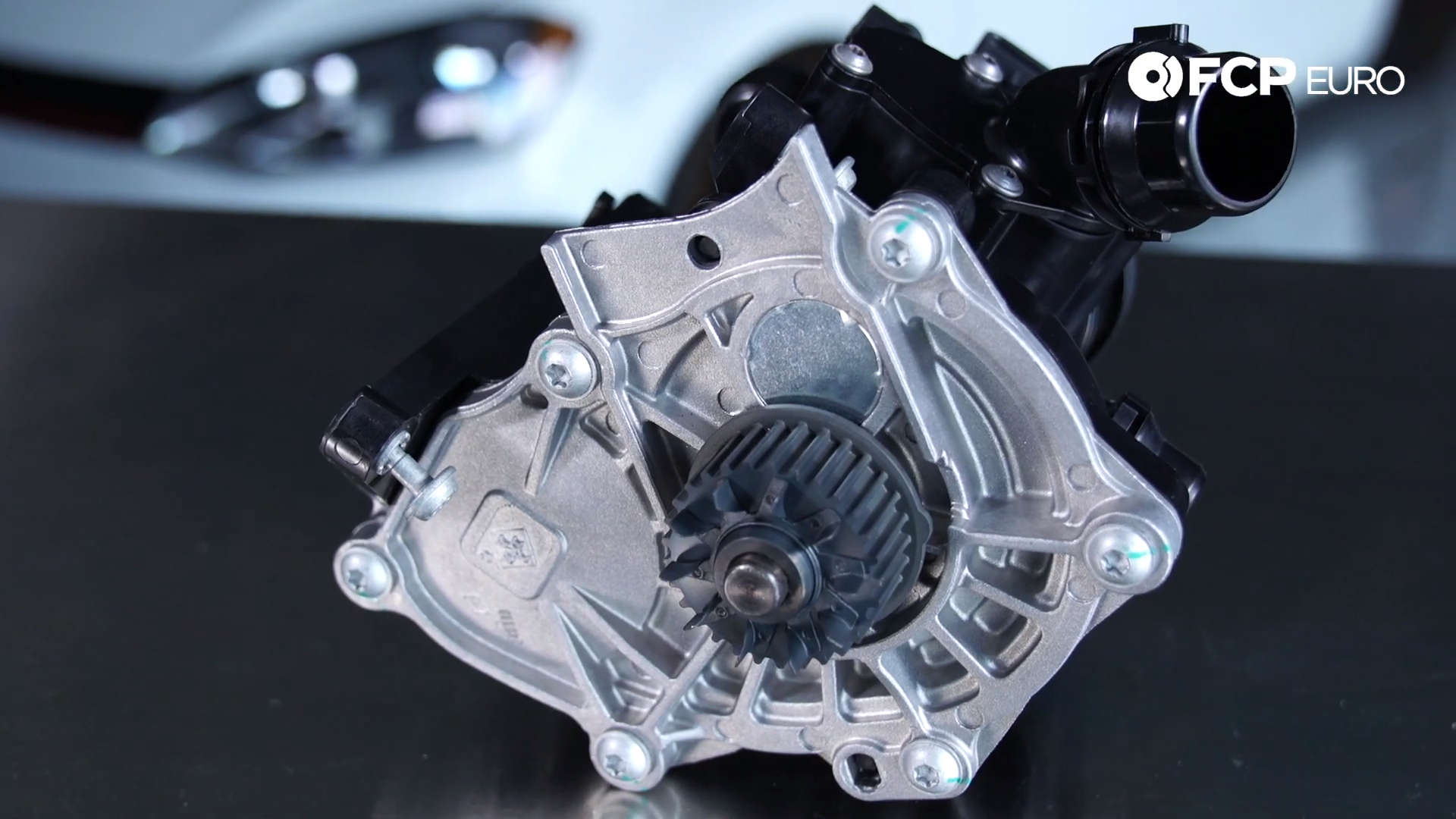 VW GTI Water Pump Thermostat Housing Closeup