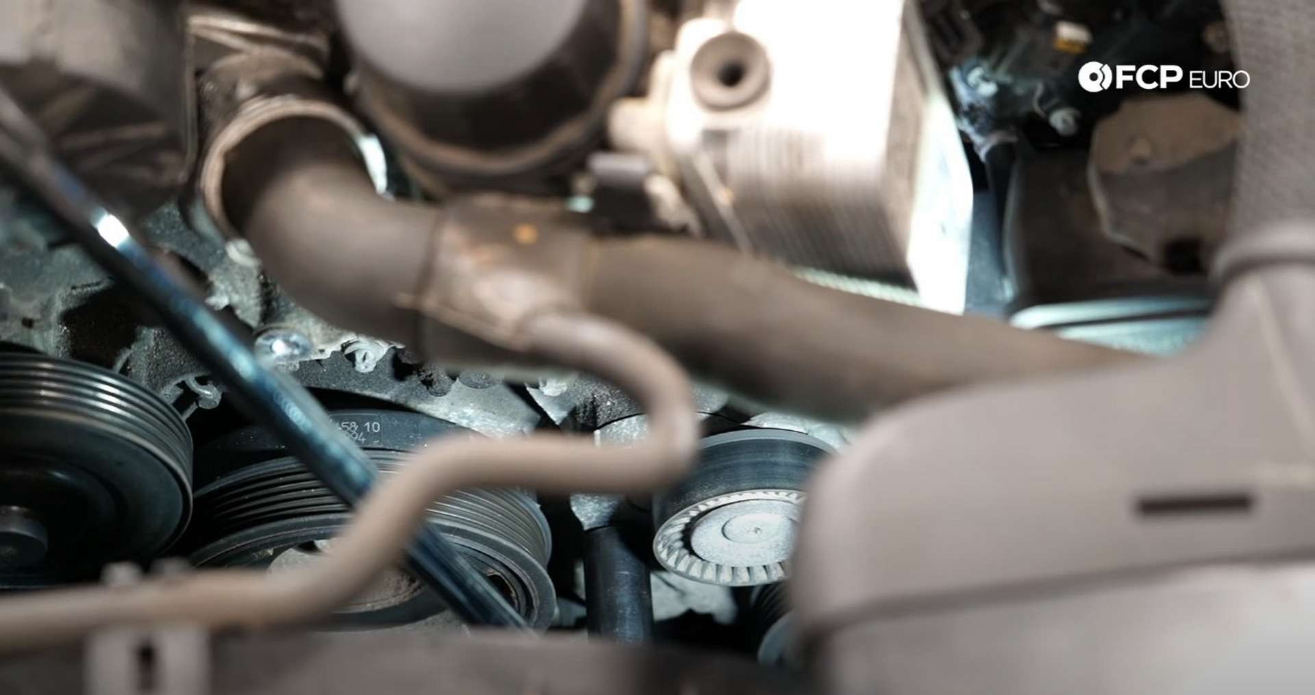 DIY Mercedes W212/204 Alternator and Drive Belt Replacement rotating the tensioner
