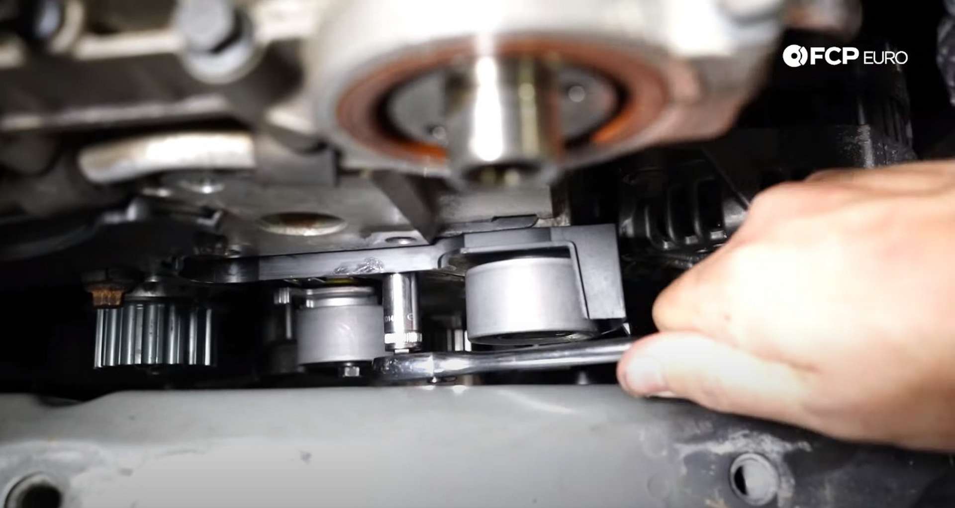 DIY Volvo P1 Timing Belt Replacement installing the new timing belt idler