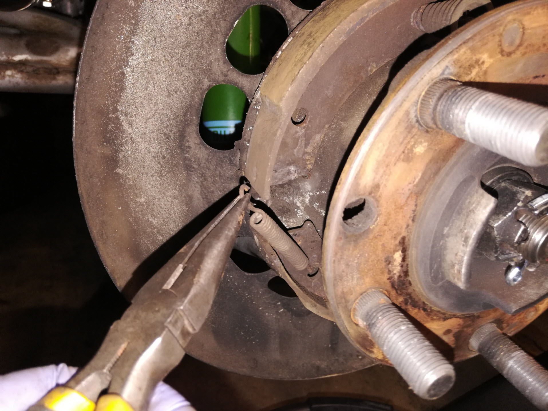 Air-cooled Porsche 911 parking brake springs removal.