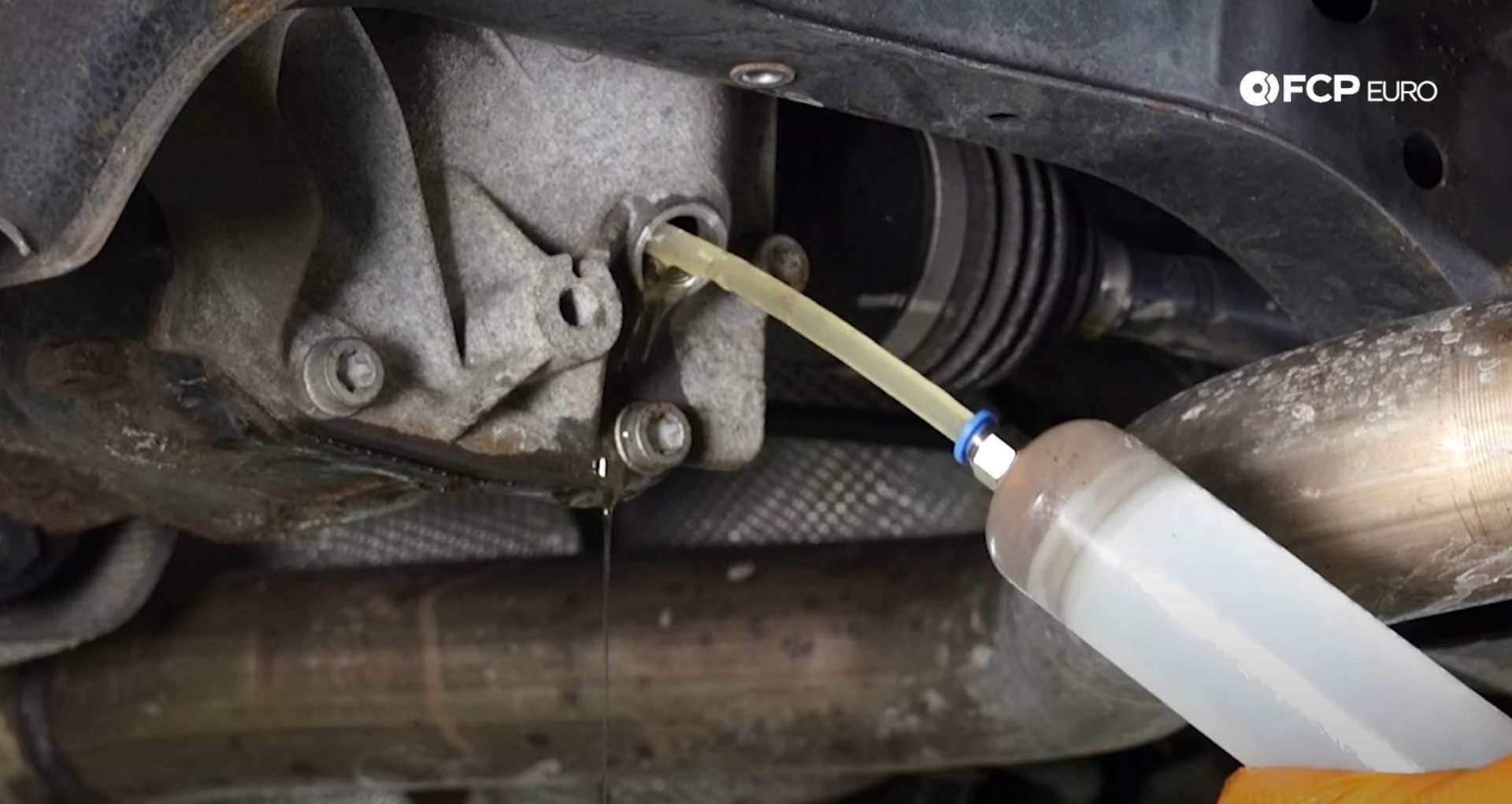 DIY BMW F30 Rear Differential Fluid Replacement filling the differential