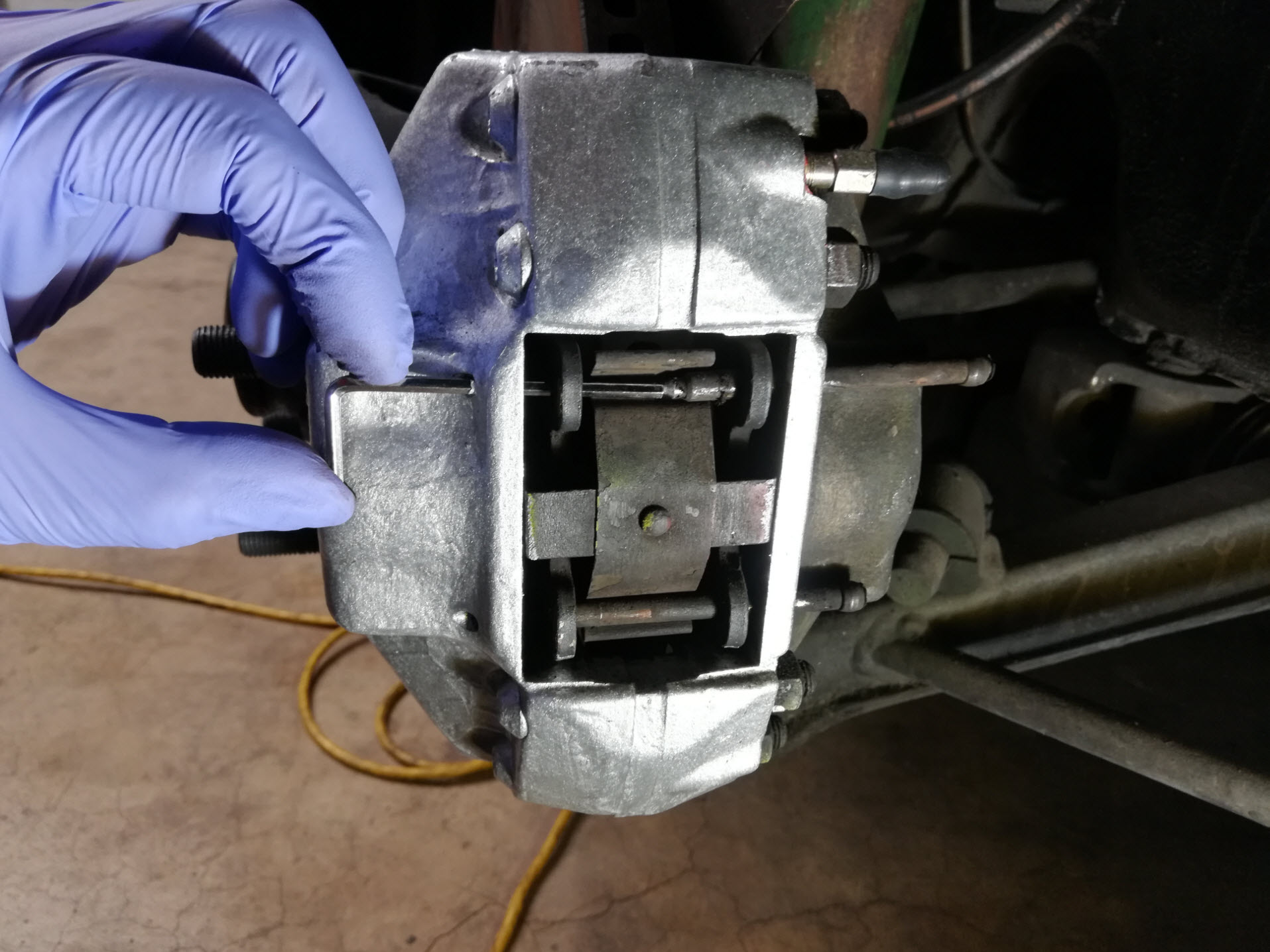 Air-cooled Porsche 911 brake retaining pin pad removal tip.