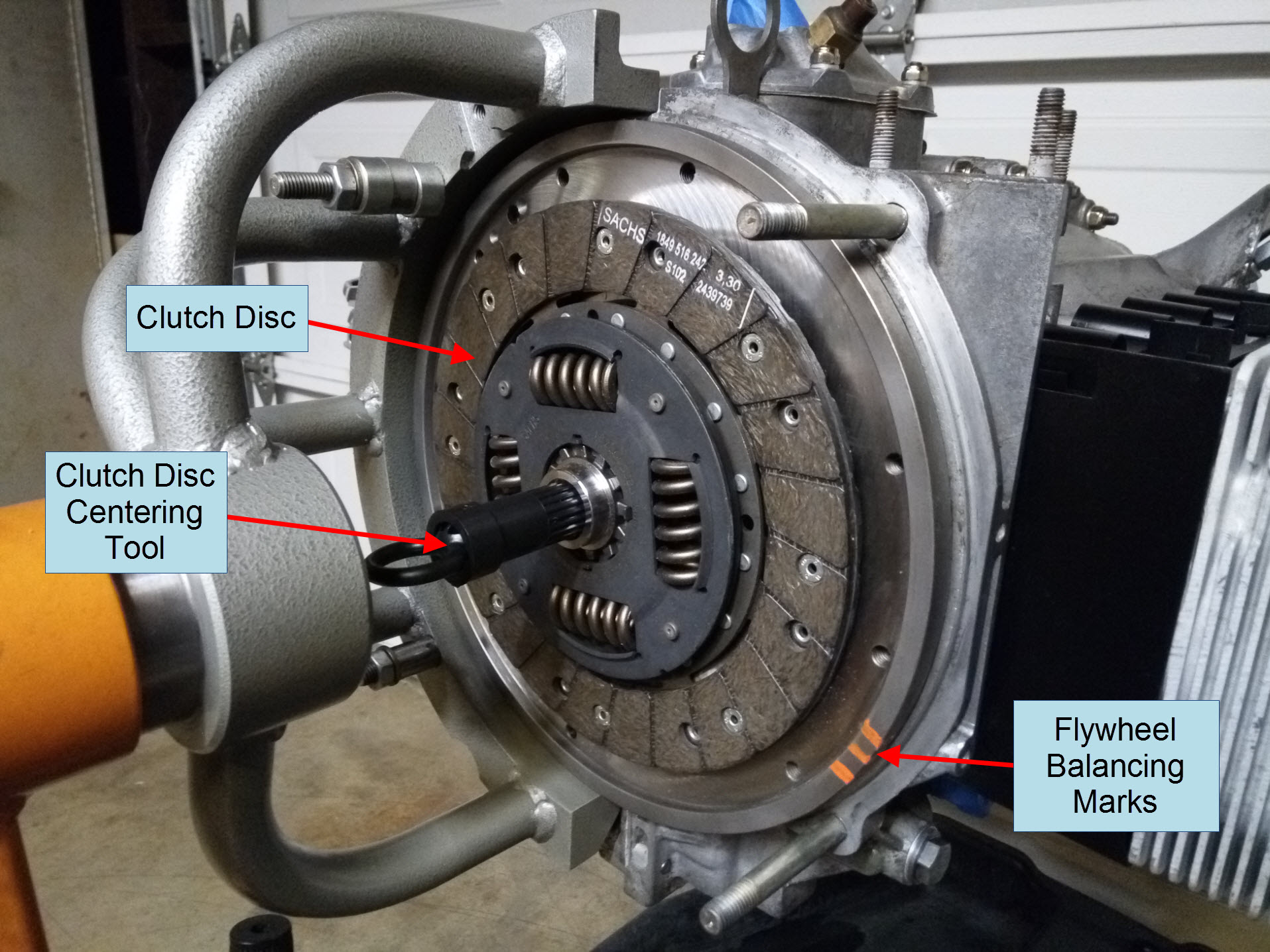 Air-cooled Porsche 911 clutch disc installation.