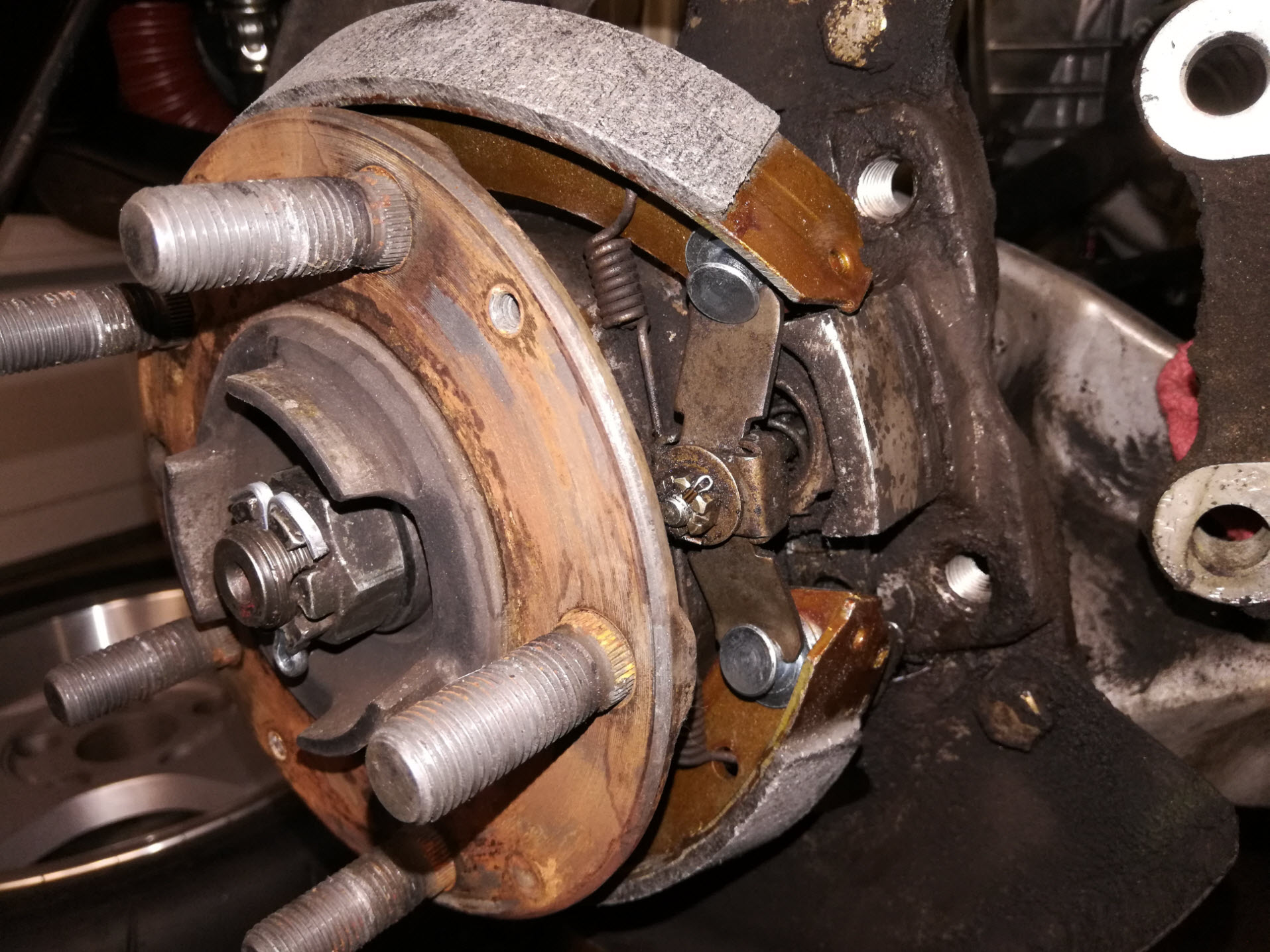 Air-cooled Porsche 911 parking brake reassembly.