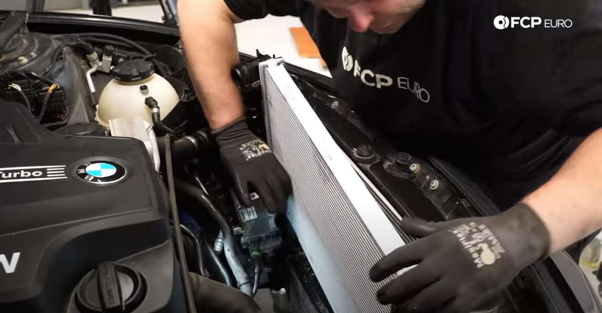 DIY BMW F30 Radiator Replacement installing the radiator