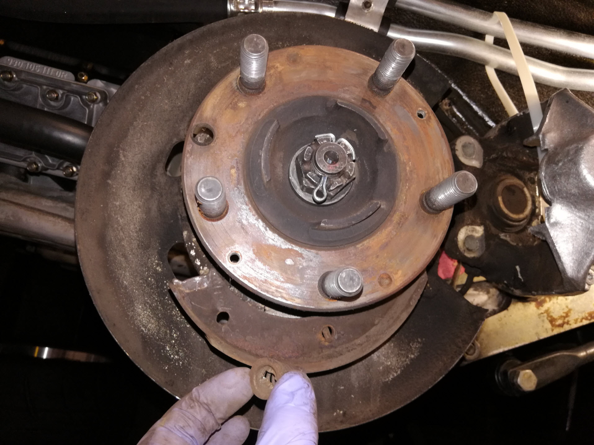 Air-cooled Porsche 911 parking brake spring removal.