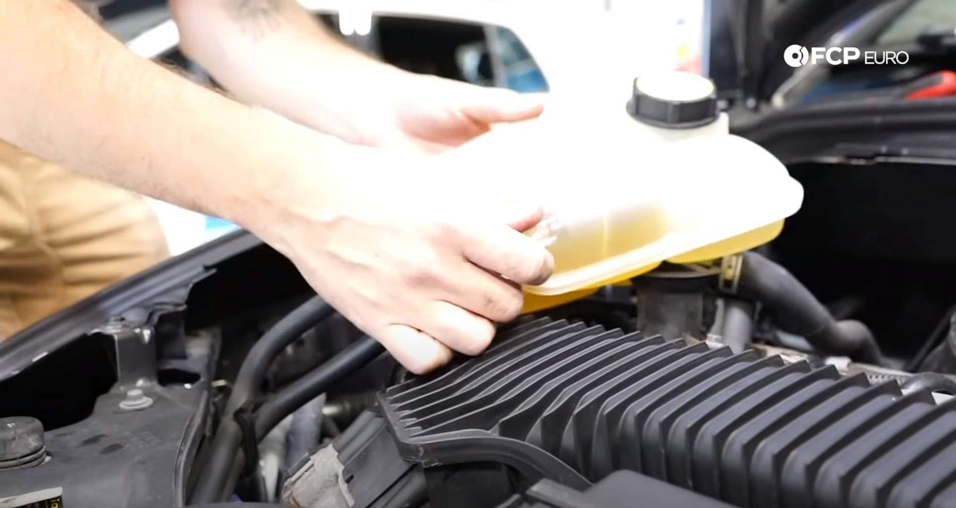 DIY Volvo P1 Timing Belt Replacement moving the coolant expansion tank