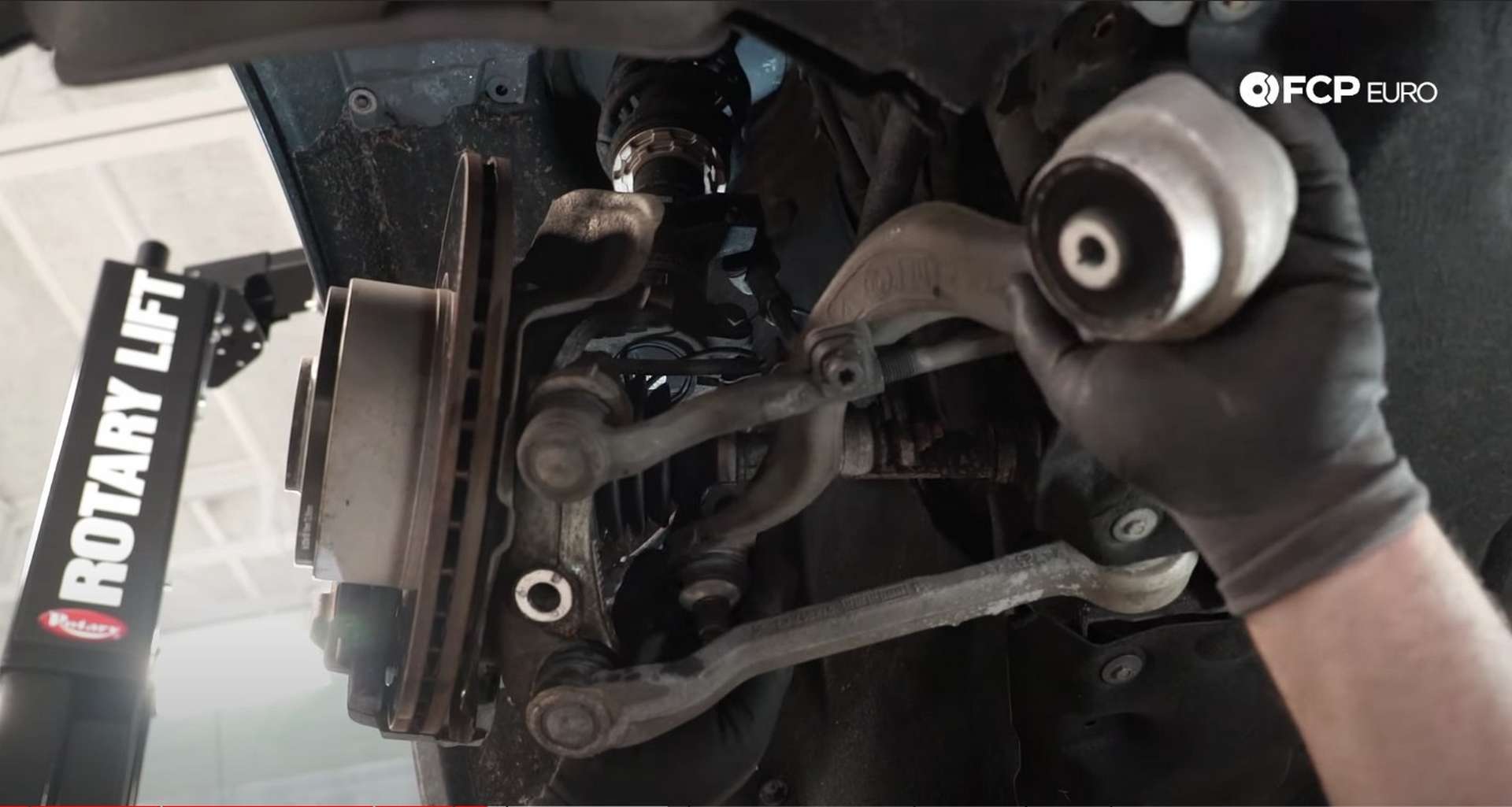 DIY BMW F30 Front Control Arm Replacement removing the thrust arm from the car
