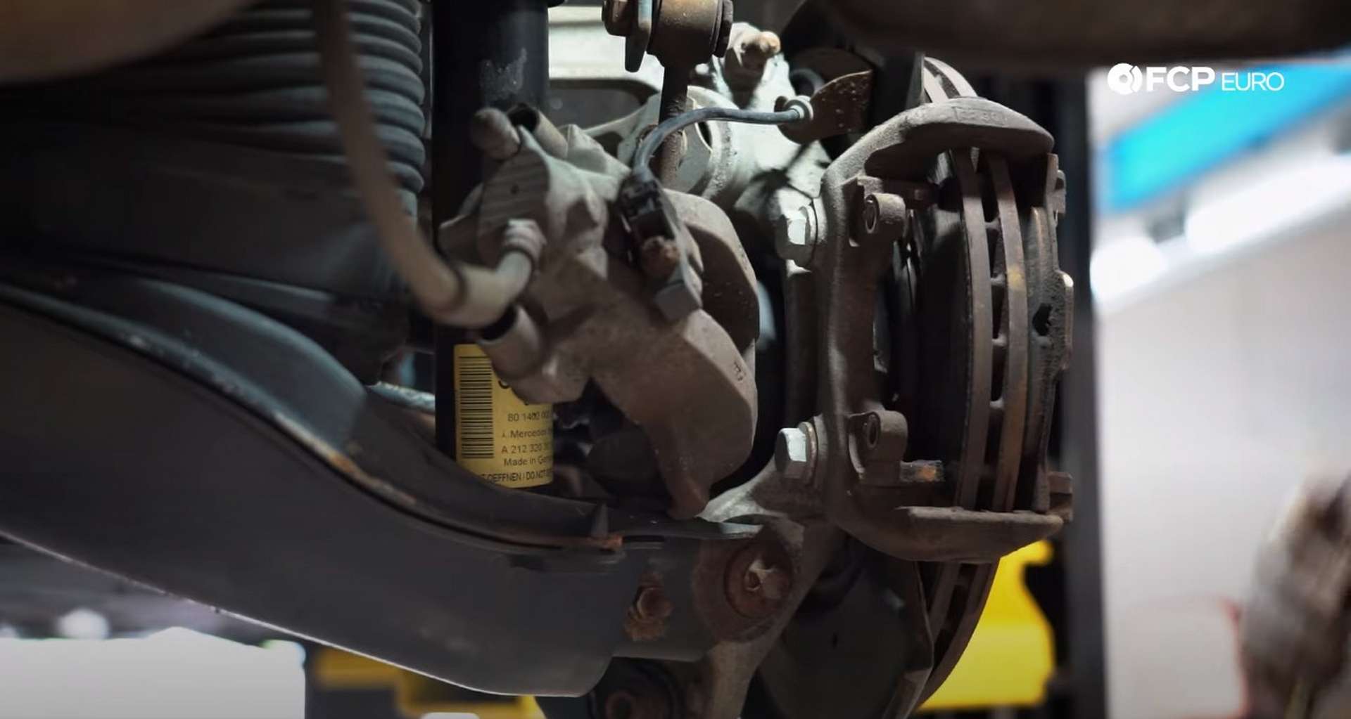 DIY Mercedes W211/212 Rear Brake Job removing the caliper