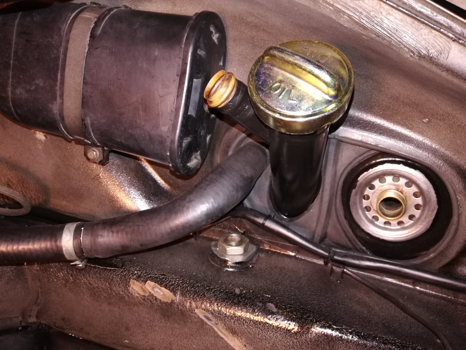 Porsche 911 oil breather restrictor re-install.