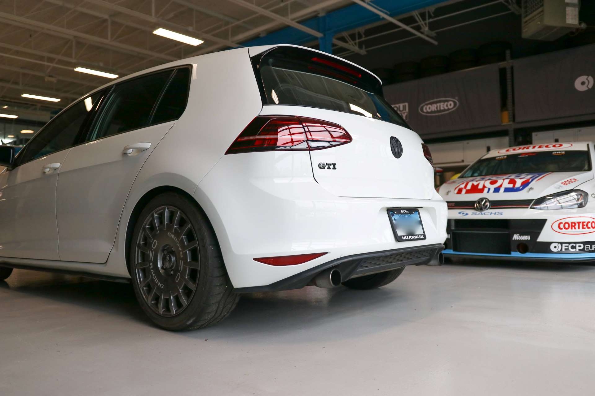 Best FWD Under $25k Volkswagen GTI Mk7 rear three-quarter
