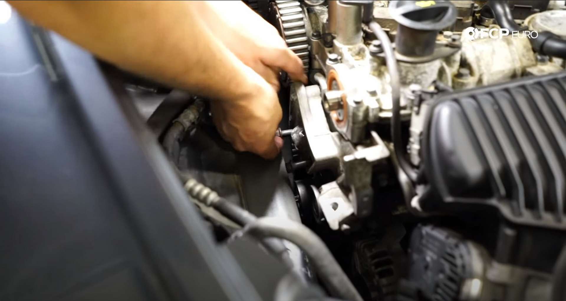 DIY Volvo P1 Timing Belt Replacement installing the engine mount bracket