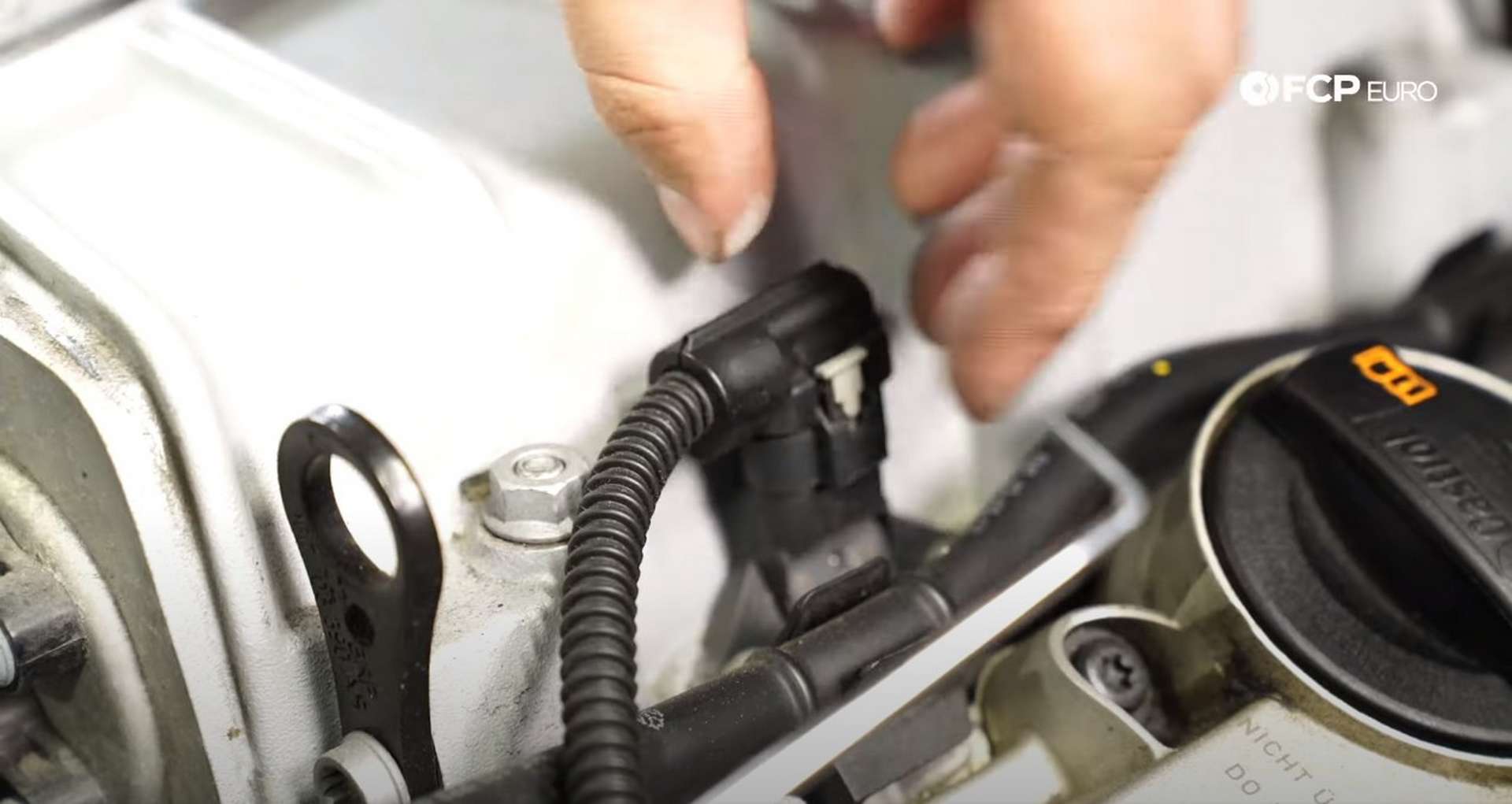 DIY Audi B8.5 Water Pump and Thermostat Replacement unplugging the map sensors