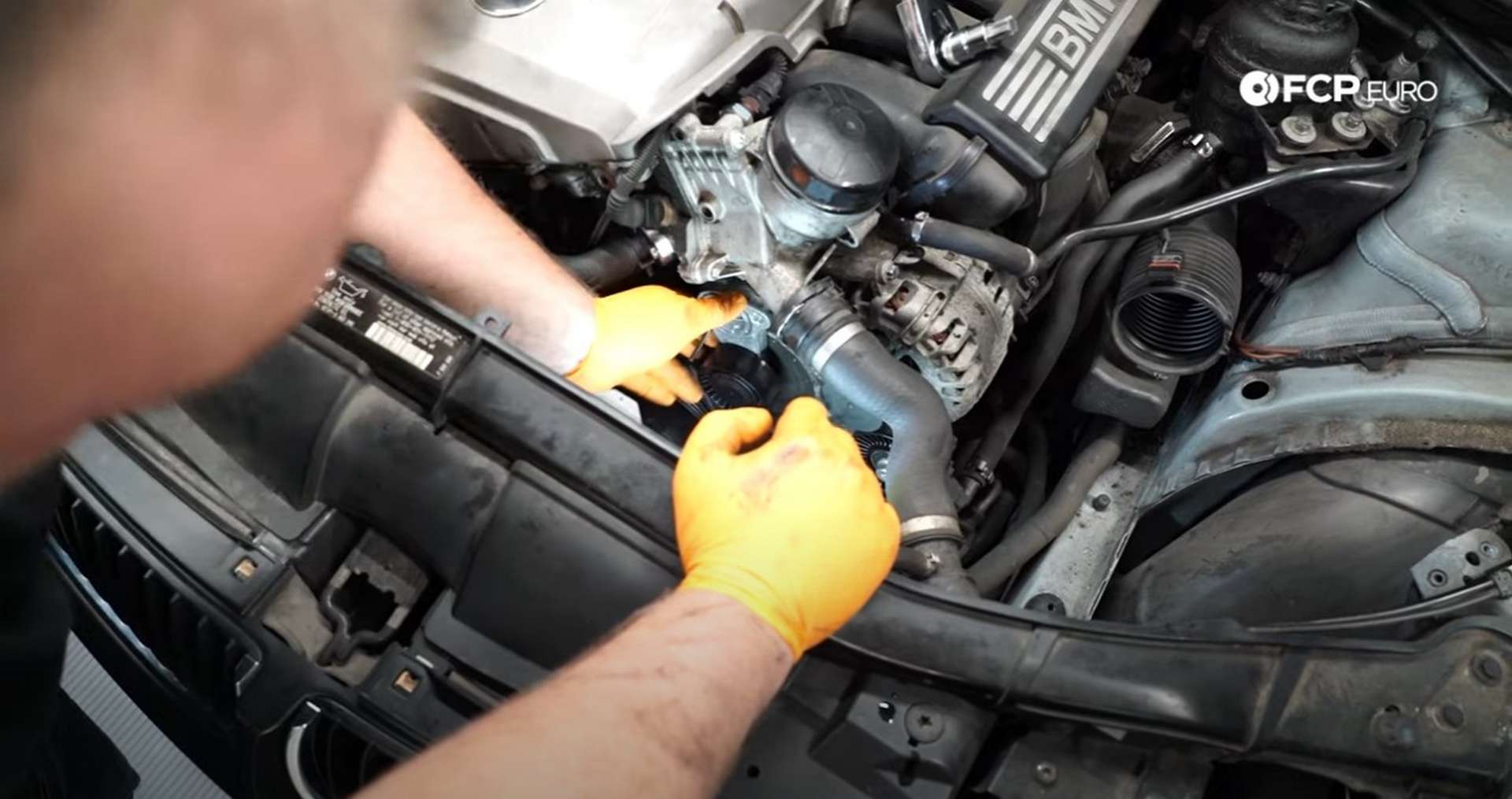 DIY BMW N52 Drive Belt Replacement installing the belt tensioner