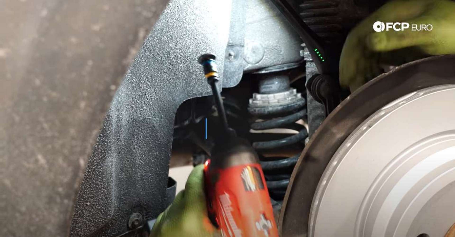 DIY BMW F30 Rear Brake Service removing the fender liner nut