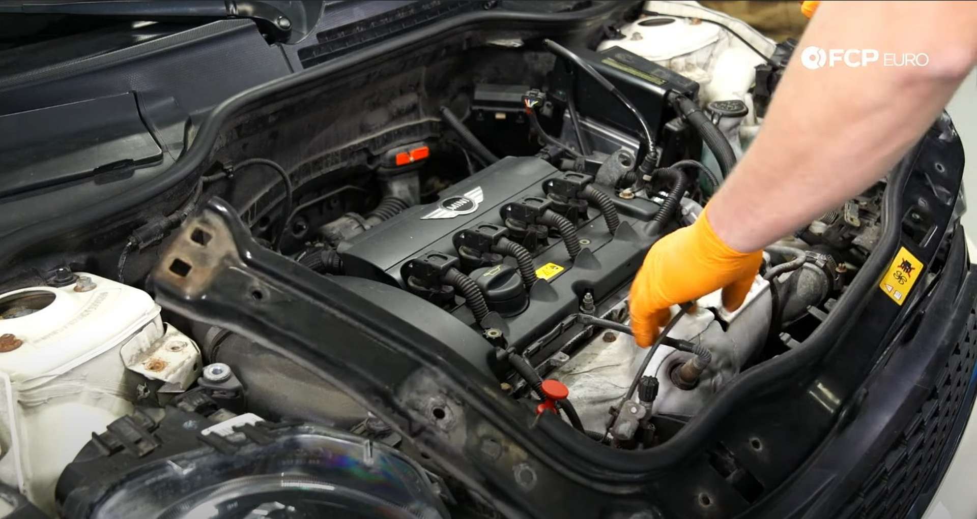 DIY MINI R56 Timing Chain Replacement removing the U-brace