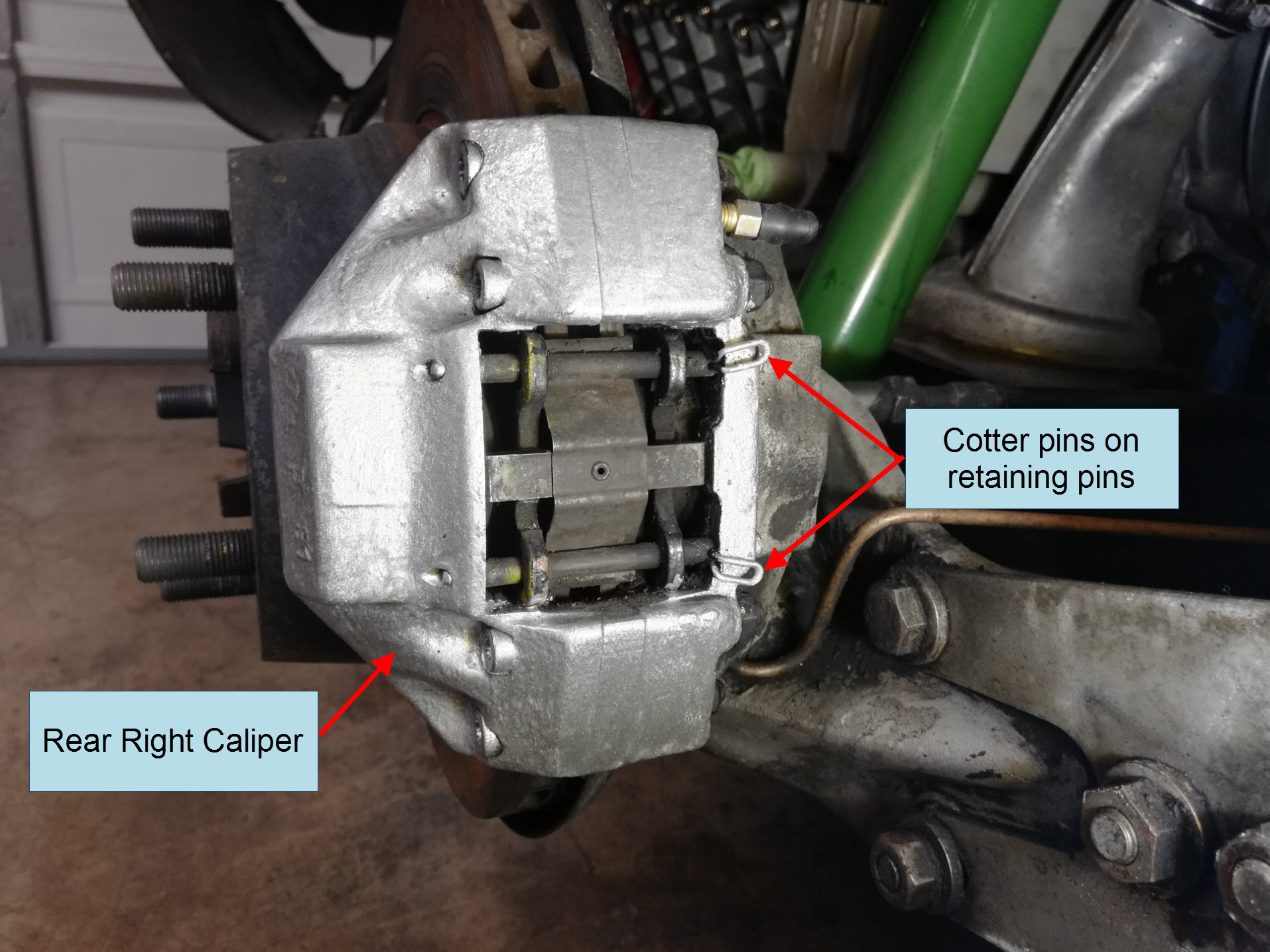 Air-cooled Porsche 911 rear brake caliper assembly.