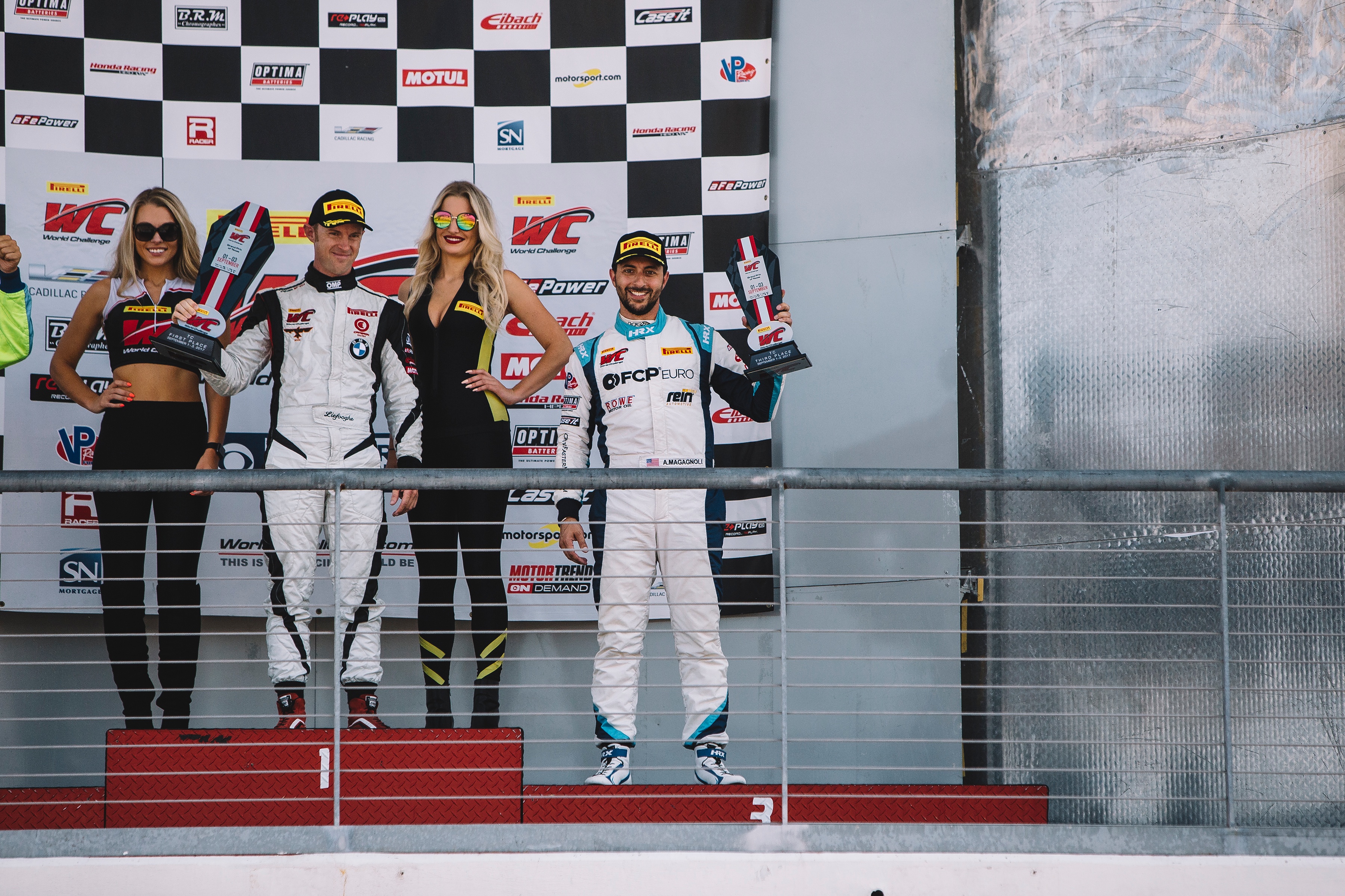 Anthony Magagnoli on the podium at CoTA