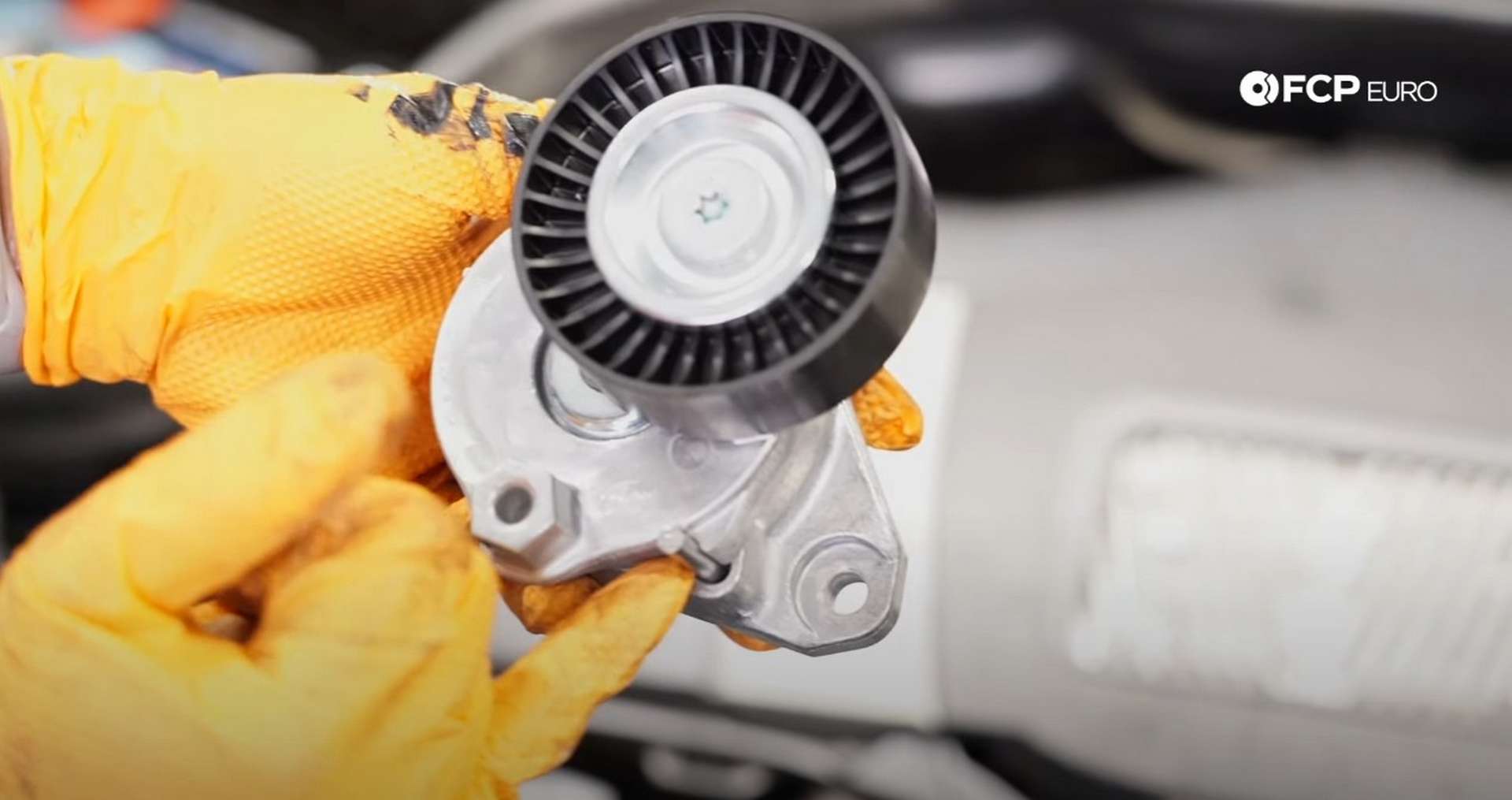DIY Mercedes W212/204 Alternator and Drive Belt Replacement rotating the tensioner