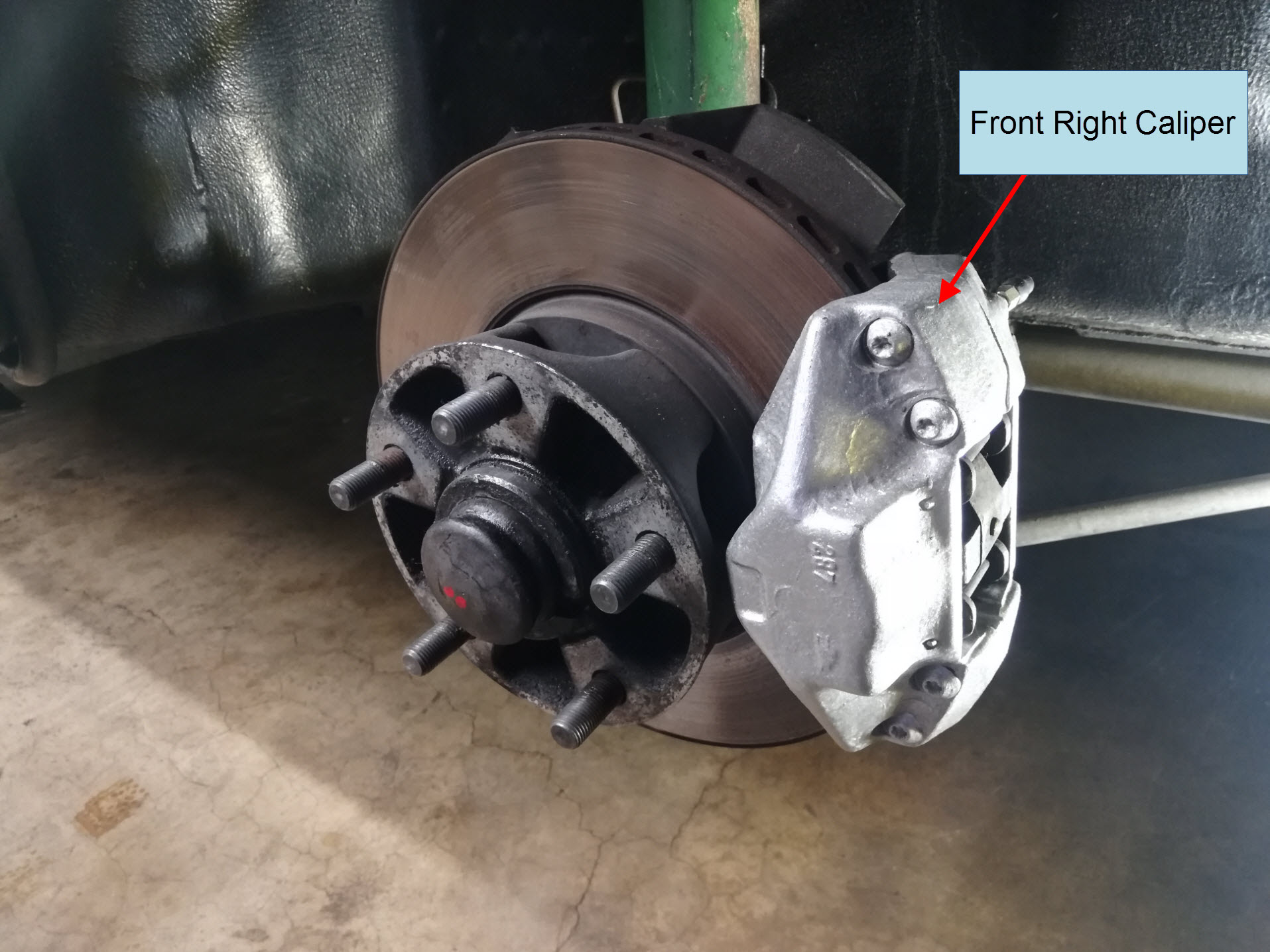 Air-cooled Porsche 911 front right brake caliper assembly.