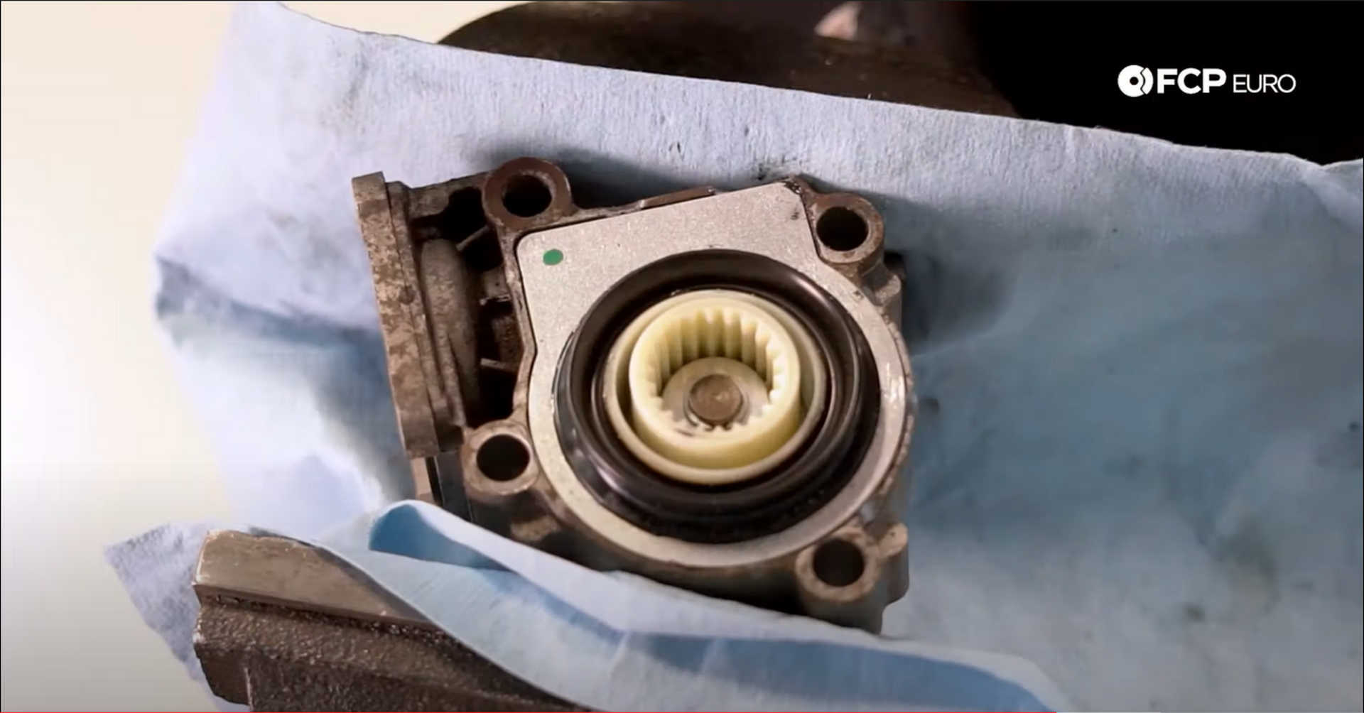 DIY BMW X3 Transfer Case Actuator applying the faceplate