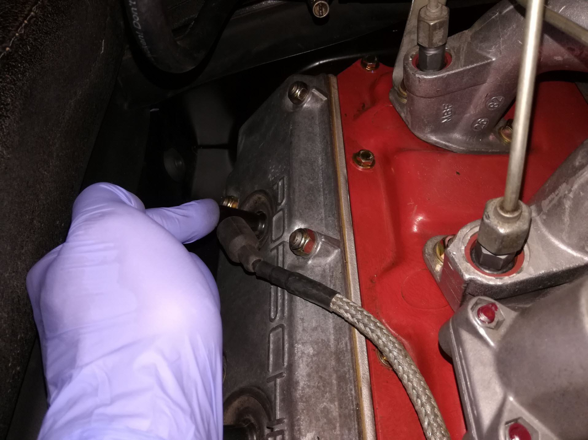 Air-cooled Porsche 911 spark plug wire installation.