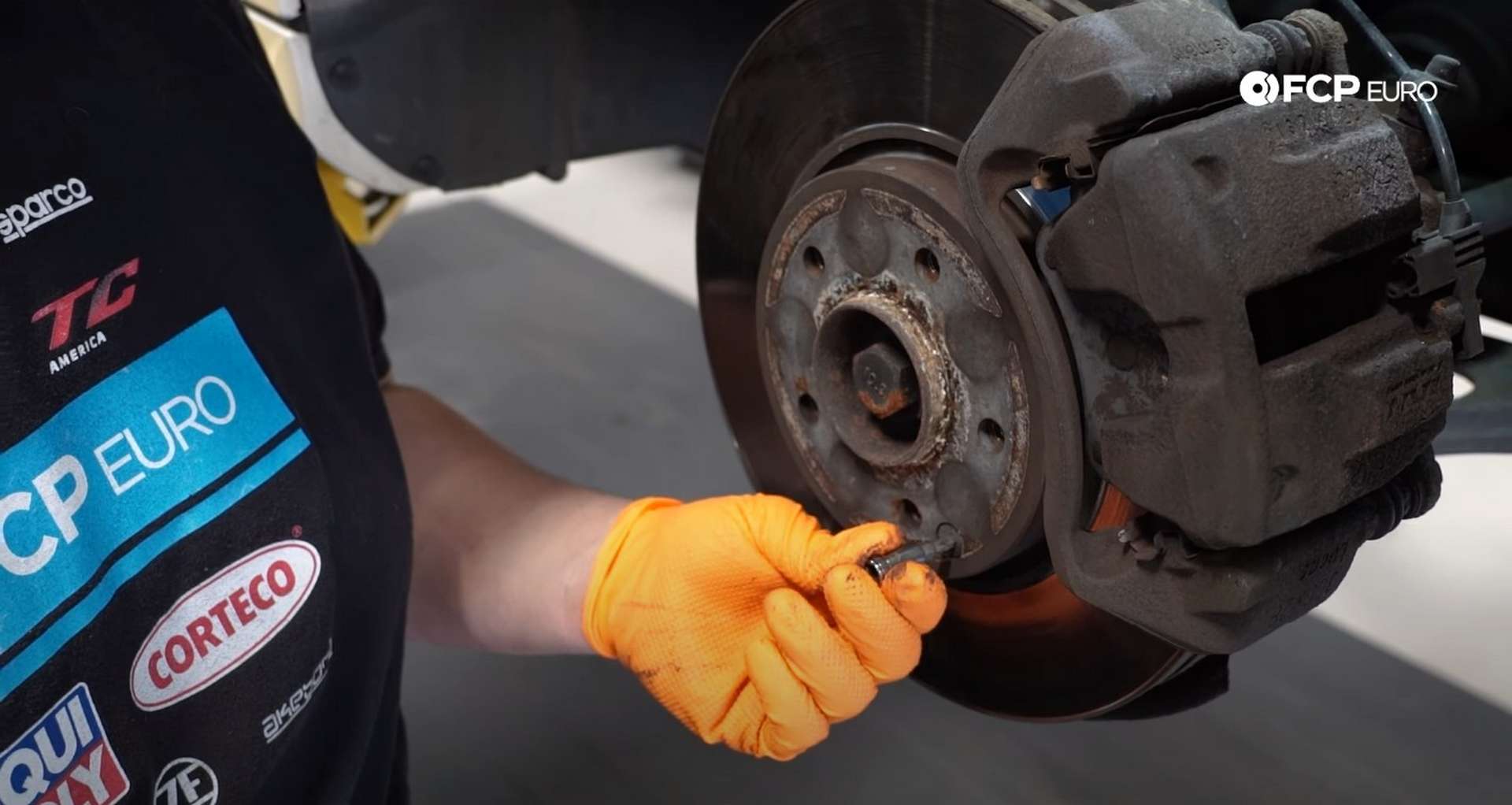 DIY Mercedes W203 Front Brake Service removing the set screw