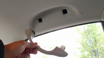 How to Replace a Rear Roof Handle on a Saab 9-3