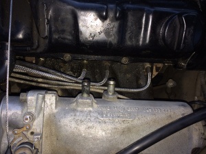 A view of the injectors from behind the head. Note the vacuum hoses having been removed to aid access.