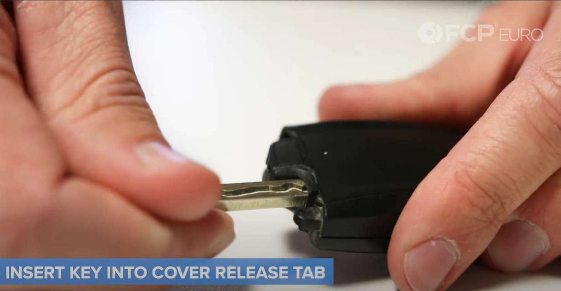 BMW F30 Key Fob Battery Replacement opening the back of the fob