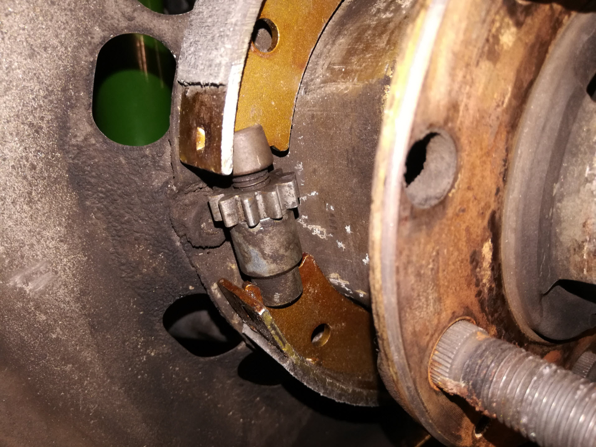 Air-cooled Porsche 911 parking brake adjuster reassembly.