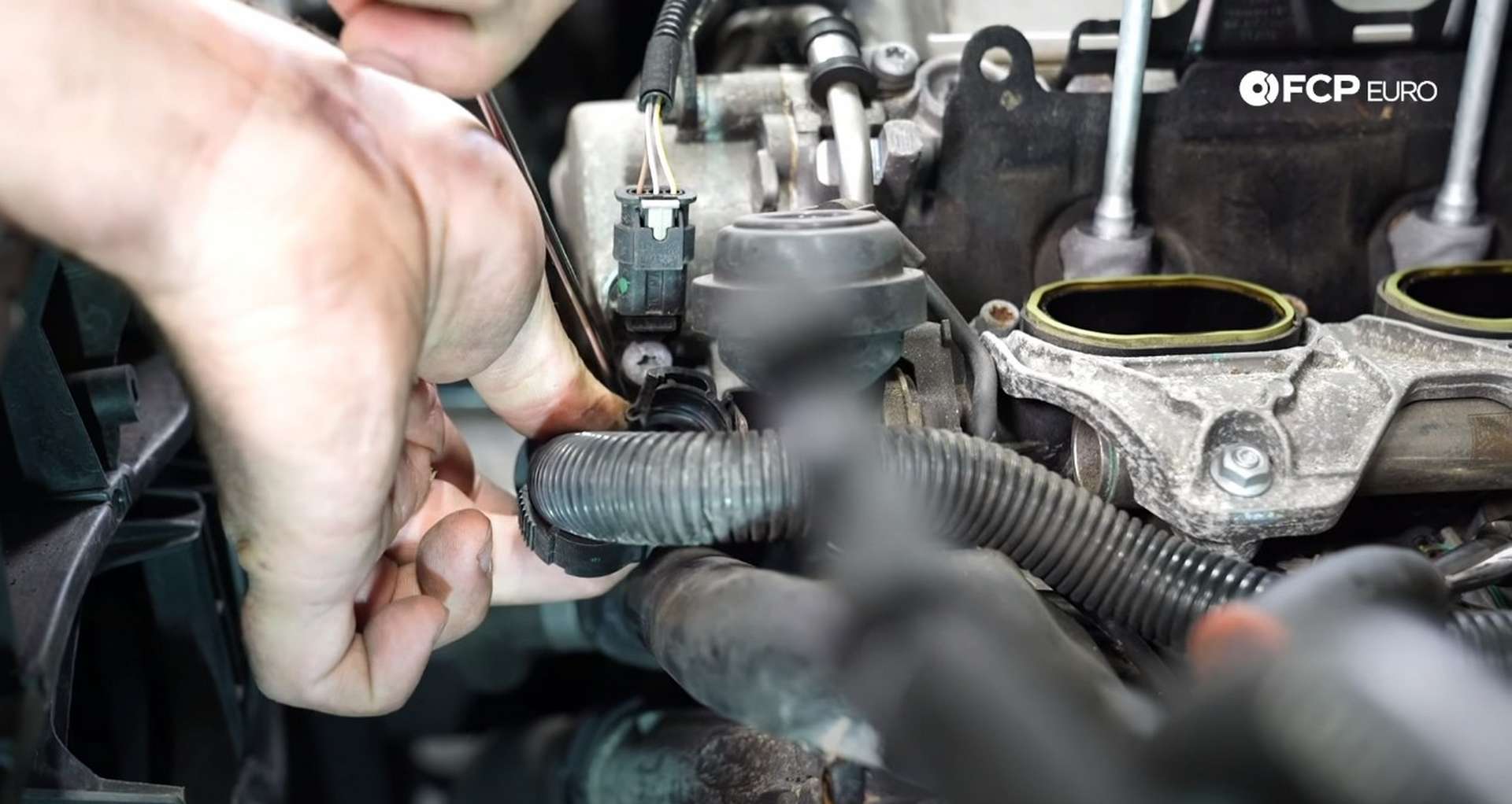 DIY Audi B8.5 Water Pump and Thermostat Replacement disconnecting the secondary air hose