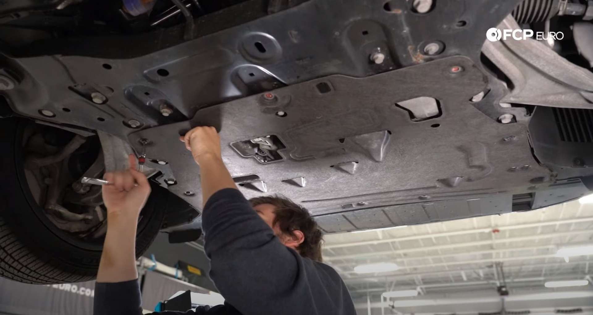 DIY Volvo SPA Oil Change installing the belly pan