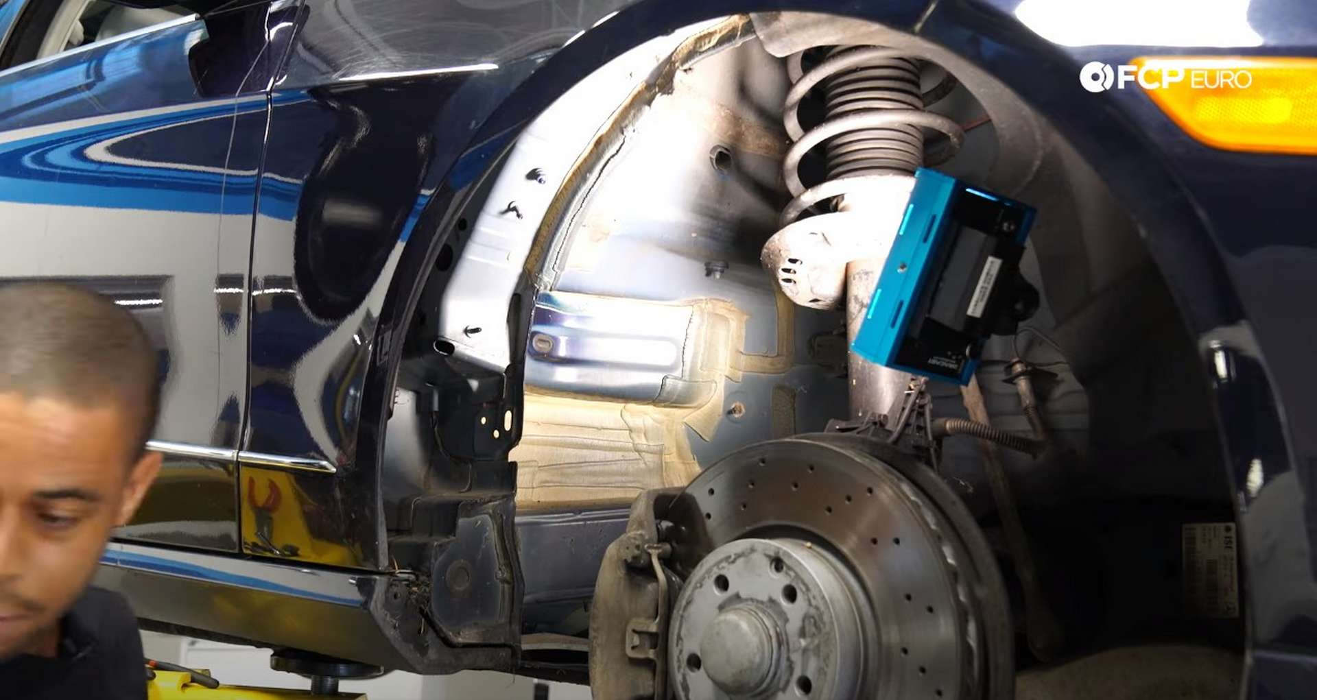 Tech Tip Preventing Interior Leaks fender liner removed for drain access
